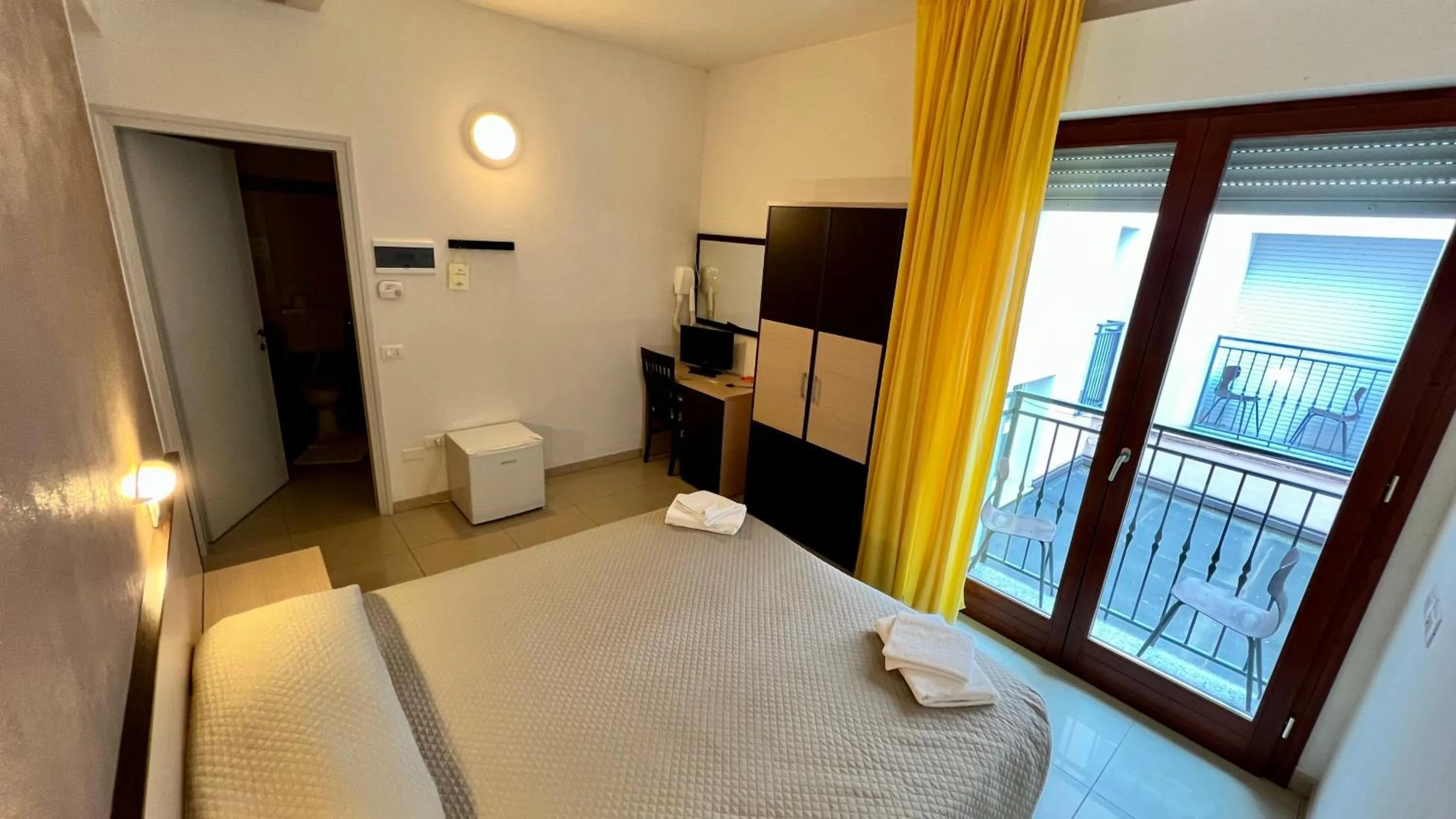 TV and multimedia, Bed in Club Vacanze In