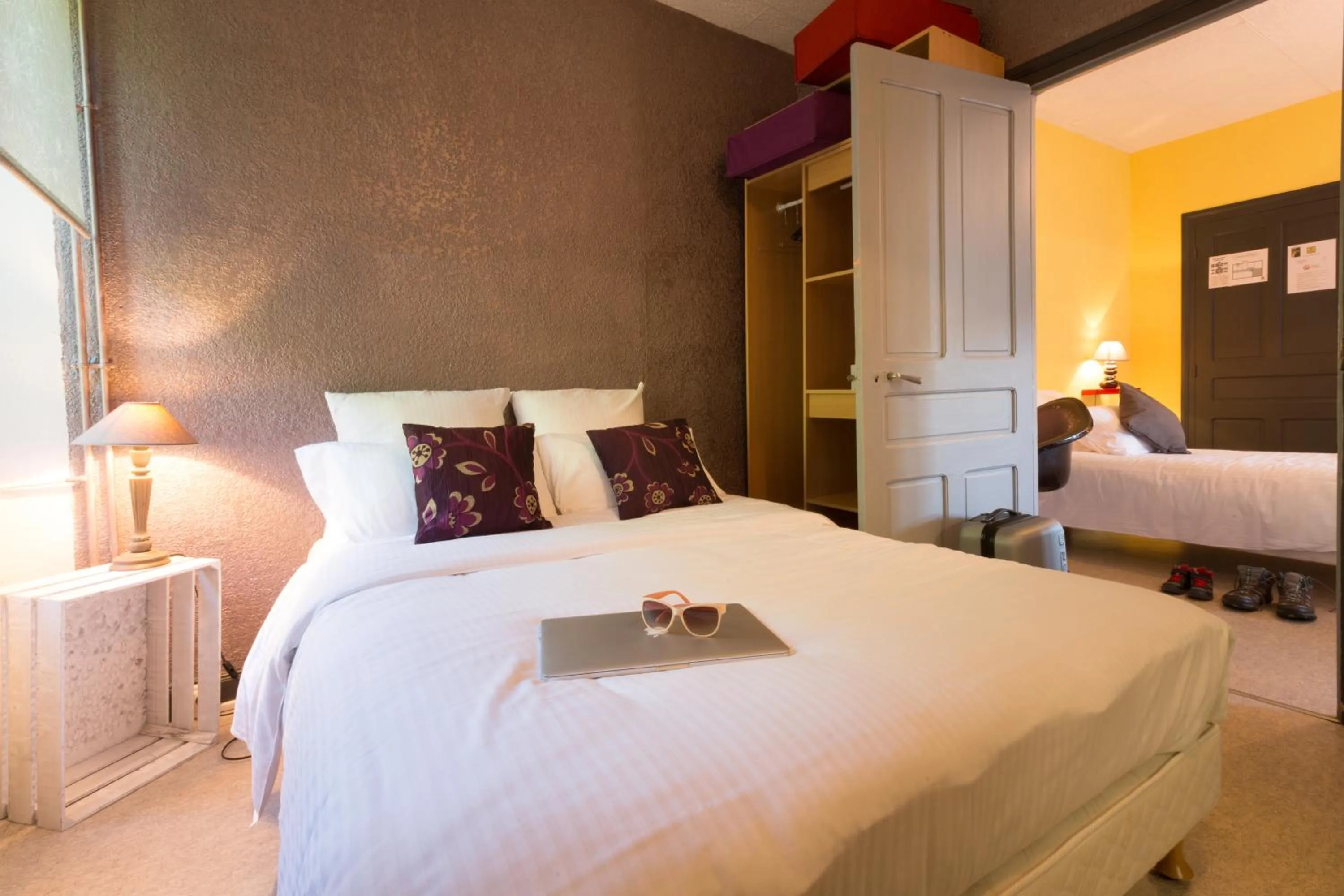 Bed in Logis Hôtel Restaurant La Brasserie