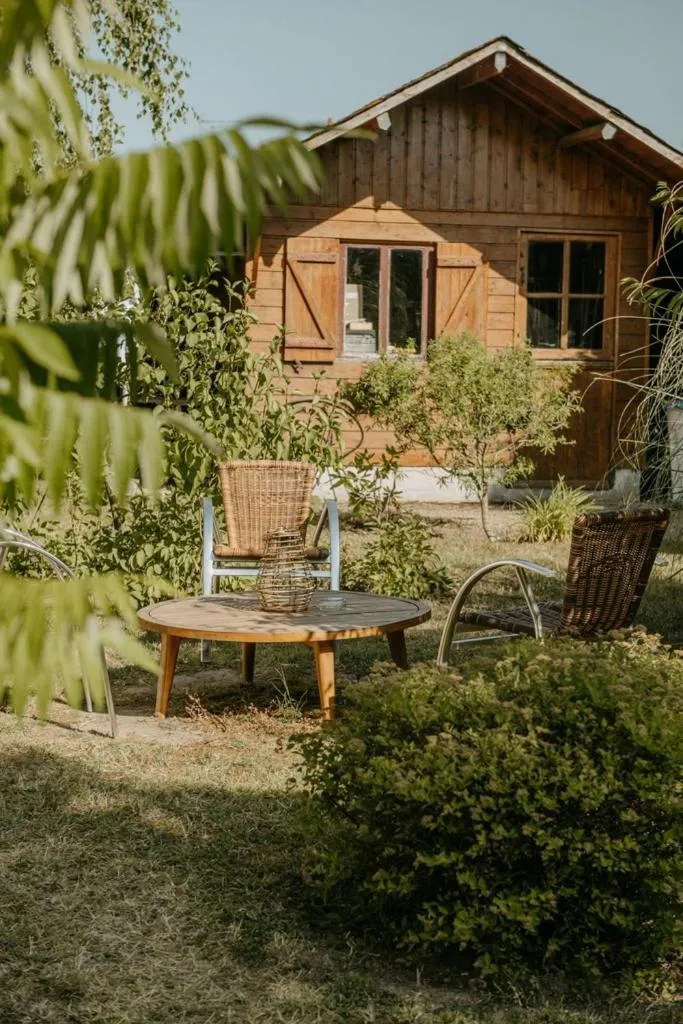 Garden view in Logis Hôtel du Château