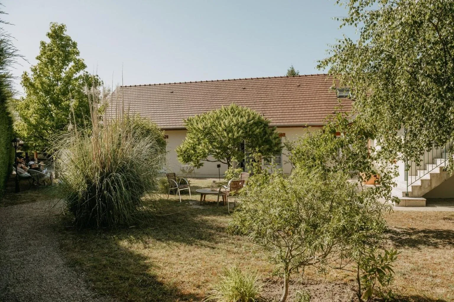 Garden view in Logis Hôtel du Château