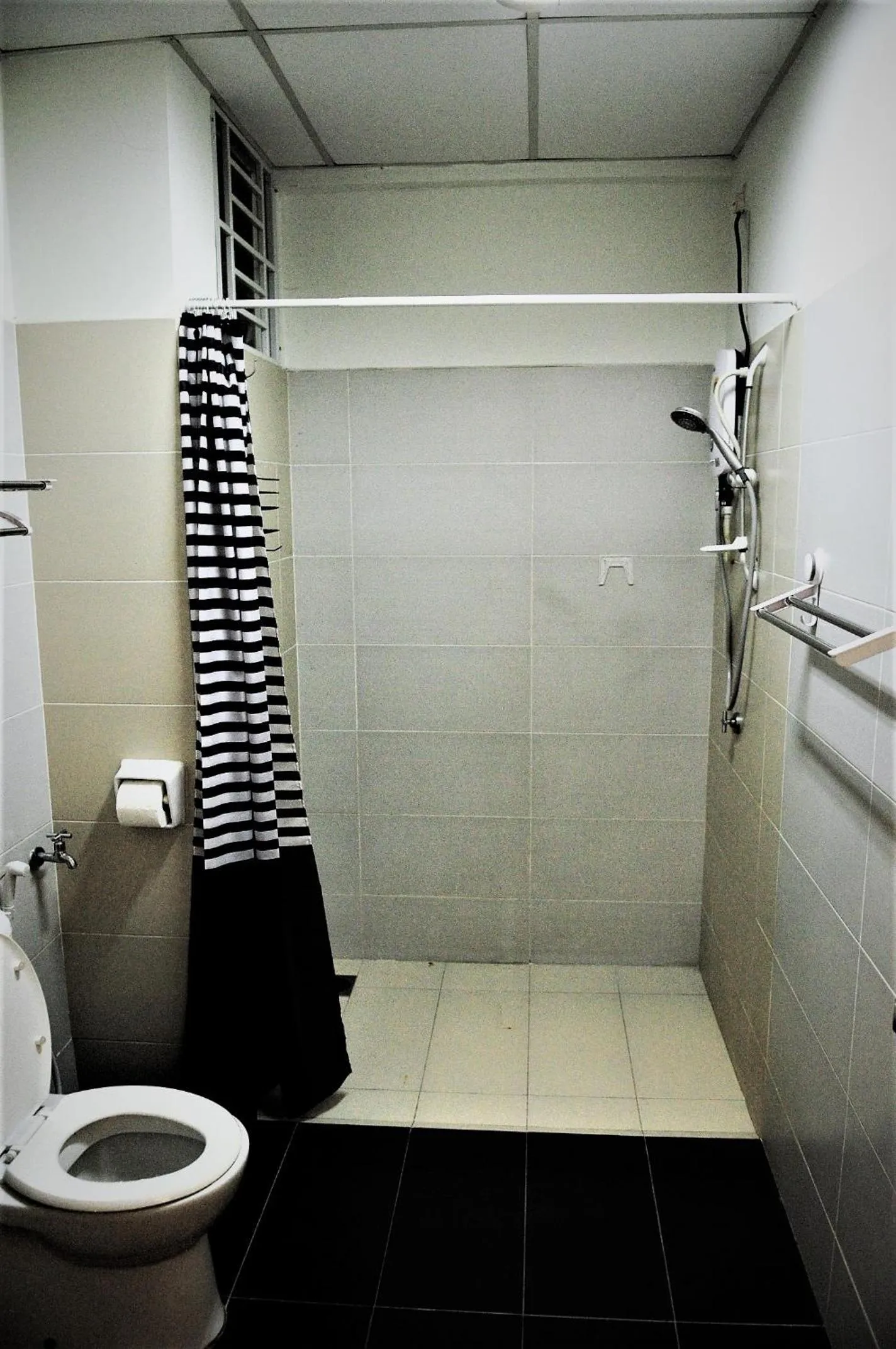 Bathroom in Akademik Suite by JK Home