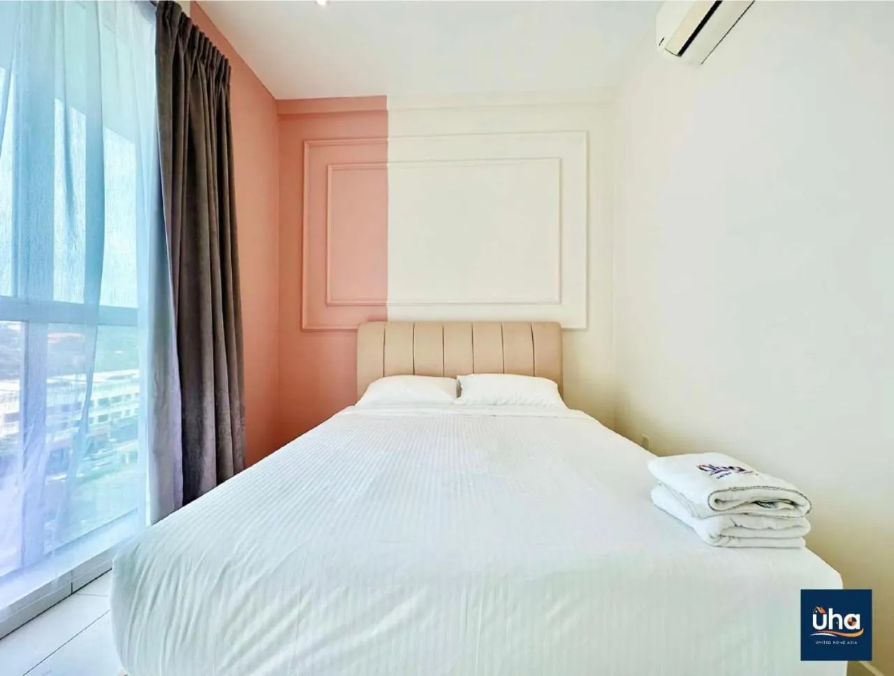 Bed in Akademik Suite by JK Home