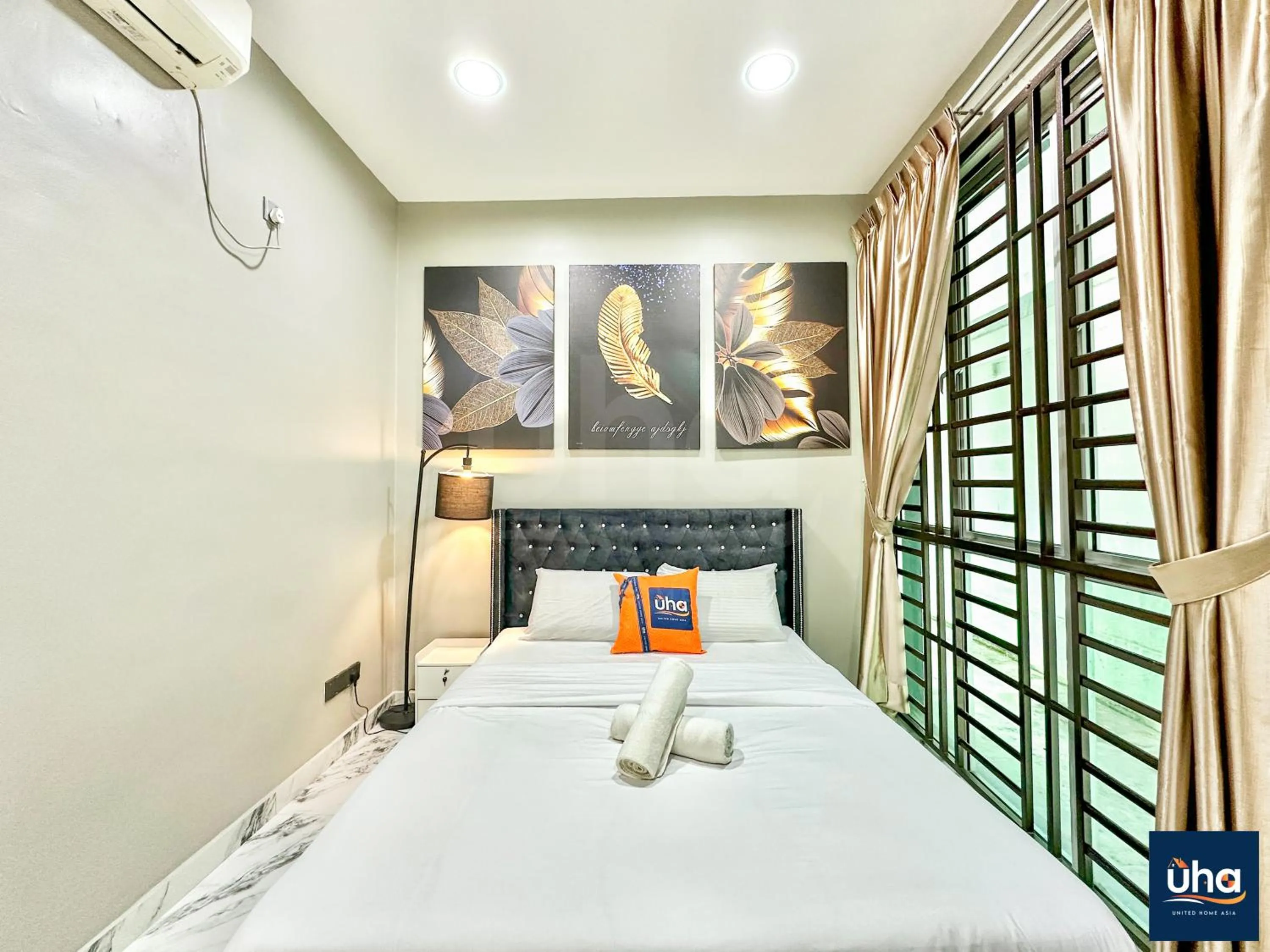 Bed in Akademik Suite by JK Home