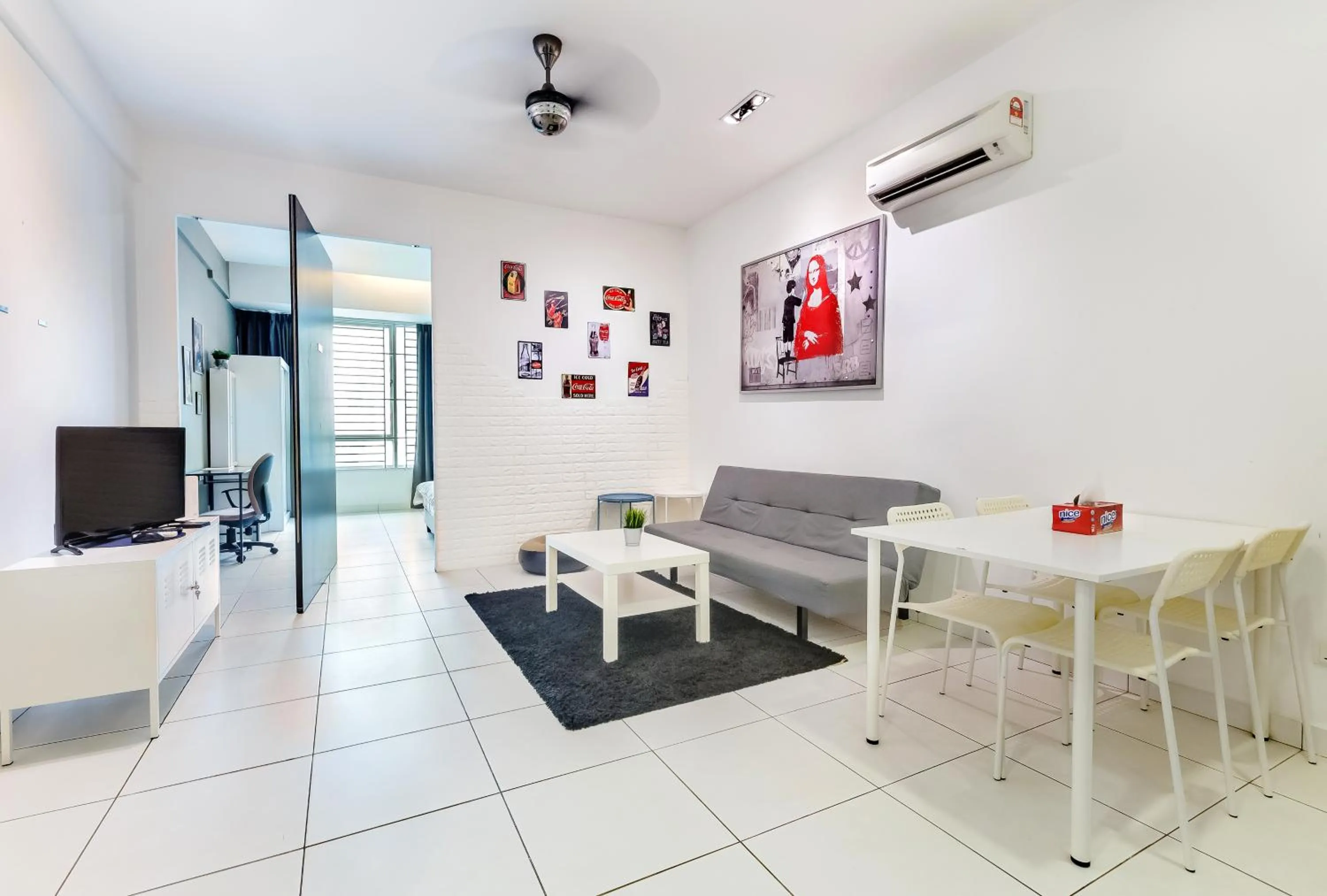 Living room in Akademik Suite by JK Home