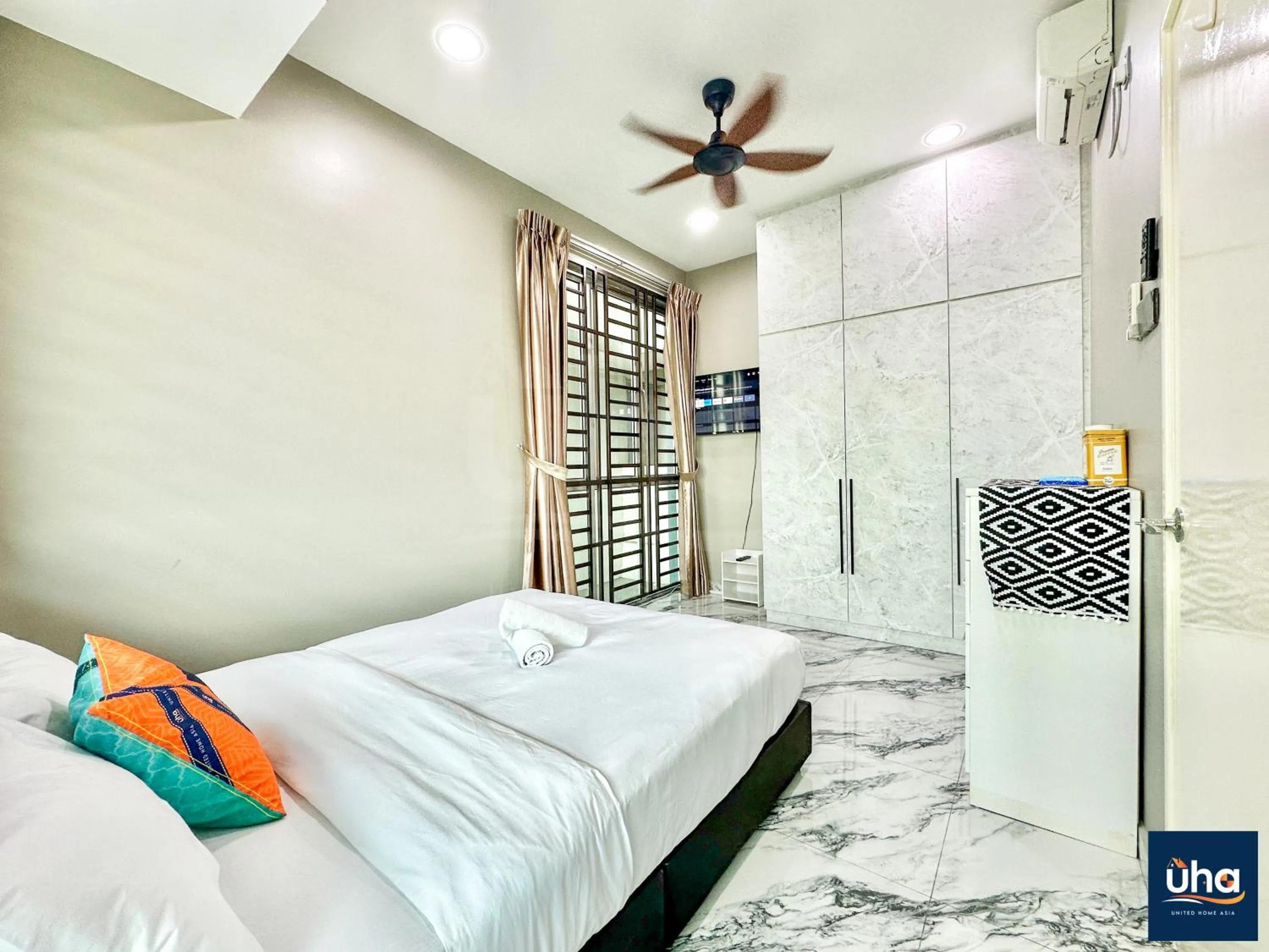 Bed in Akademik Suite by JK Home