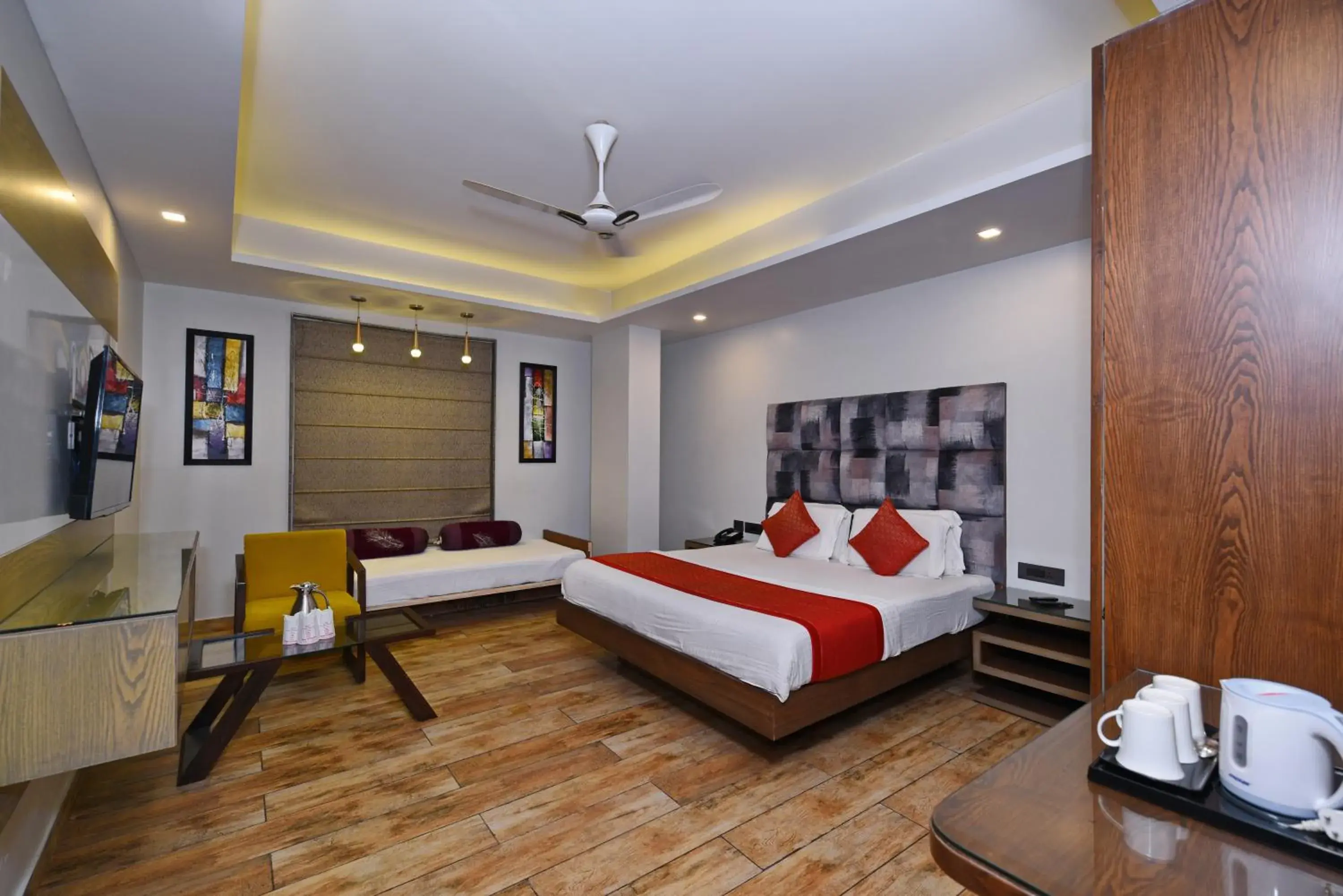 Executive Triple Room in Staybook Hotel Nitya Maharani, Free Airport Pickup Executive Triple Room in Staybook Hotel Nitya Maharani, Free Airport Pickup