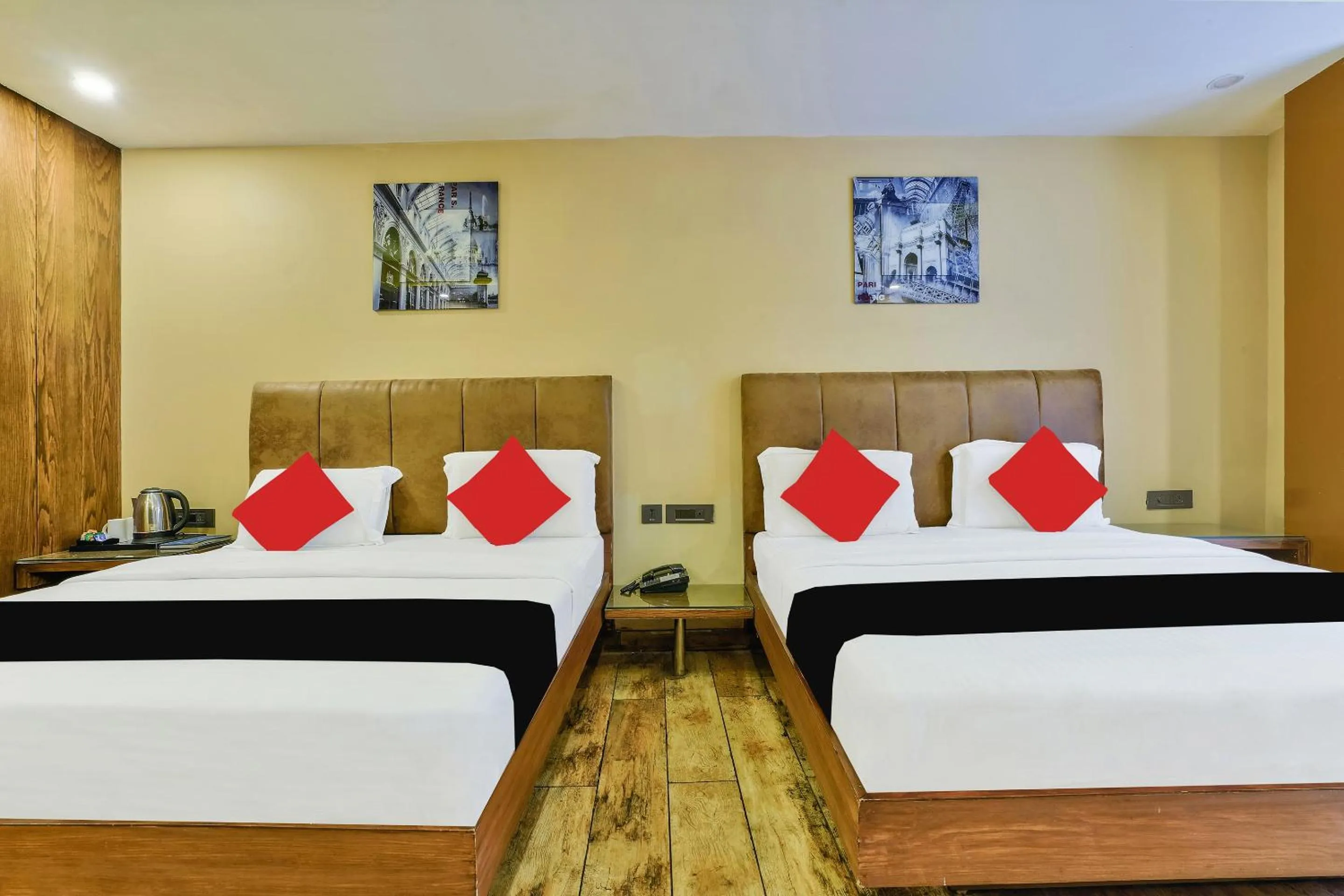 Bed in Staybook Hotel Nitya Maharani, Free Airport Pickup