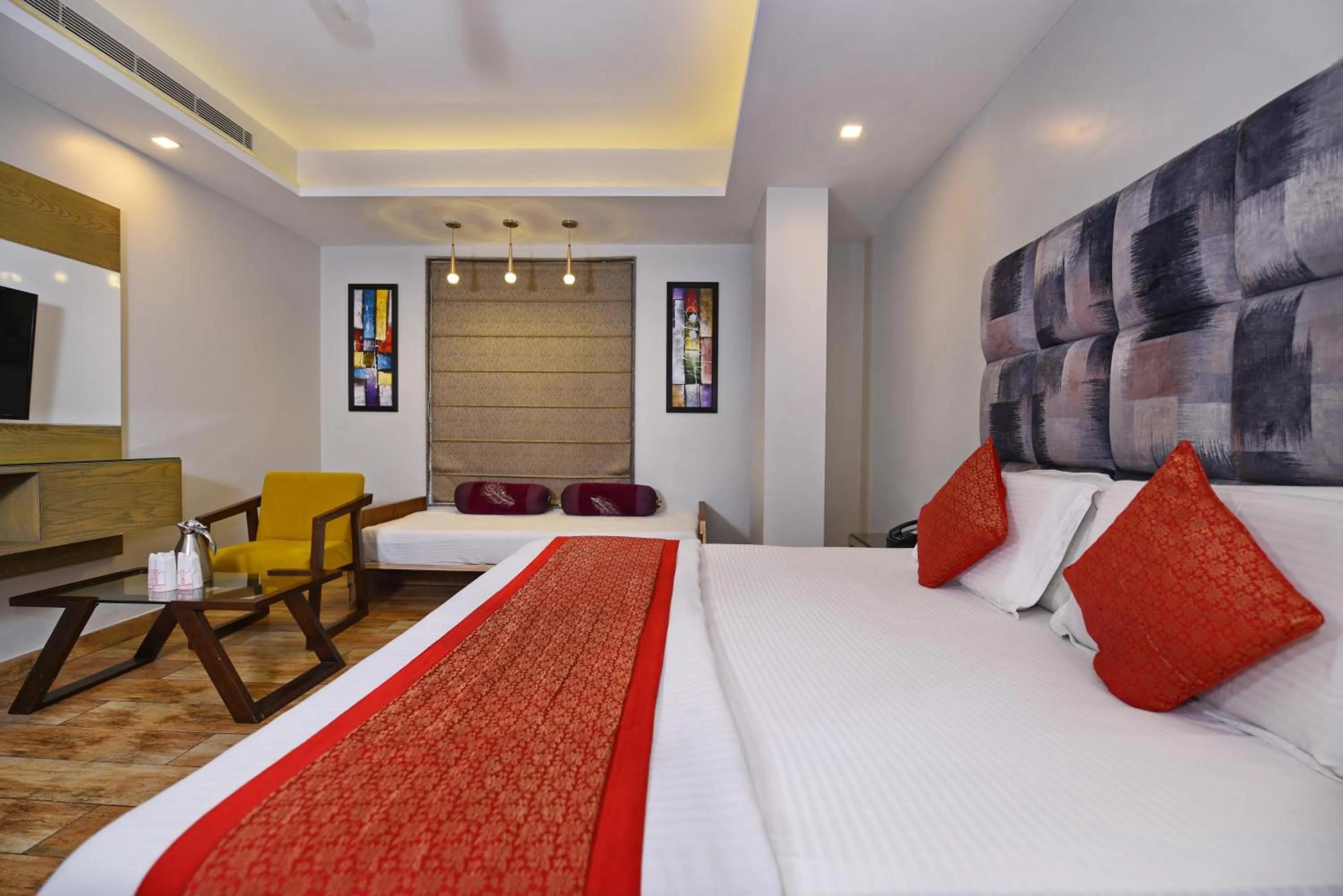 Bed in Staybook Hotel Nitya Maharani, Free Airport Pickup