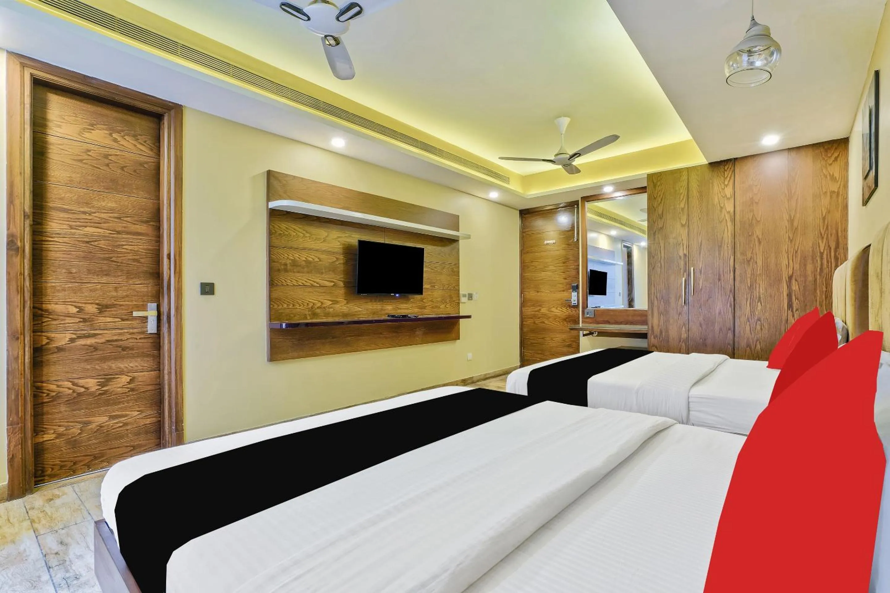 Bed in Staybook Hotel Nitya Maharani, Free Airport Pickup