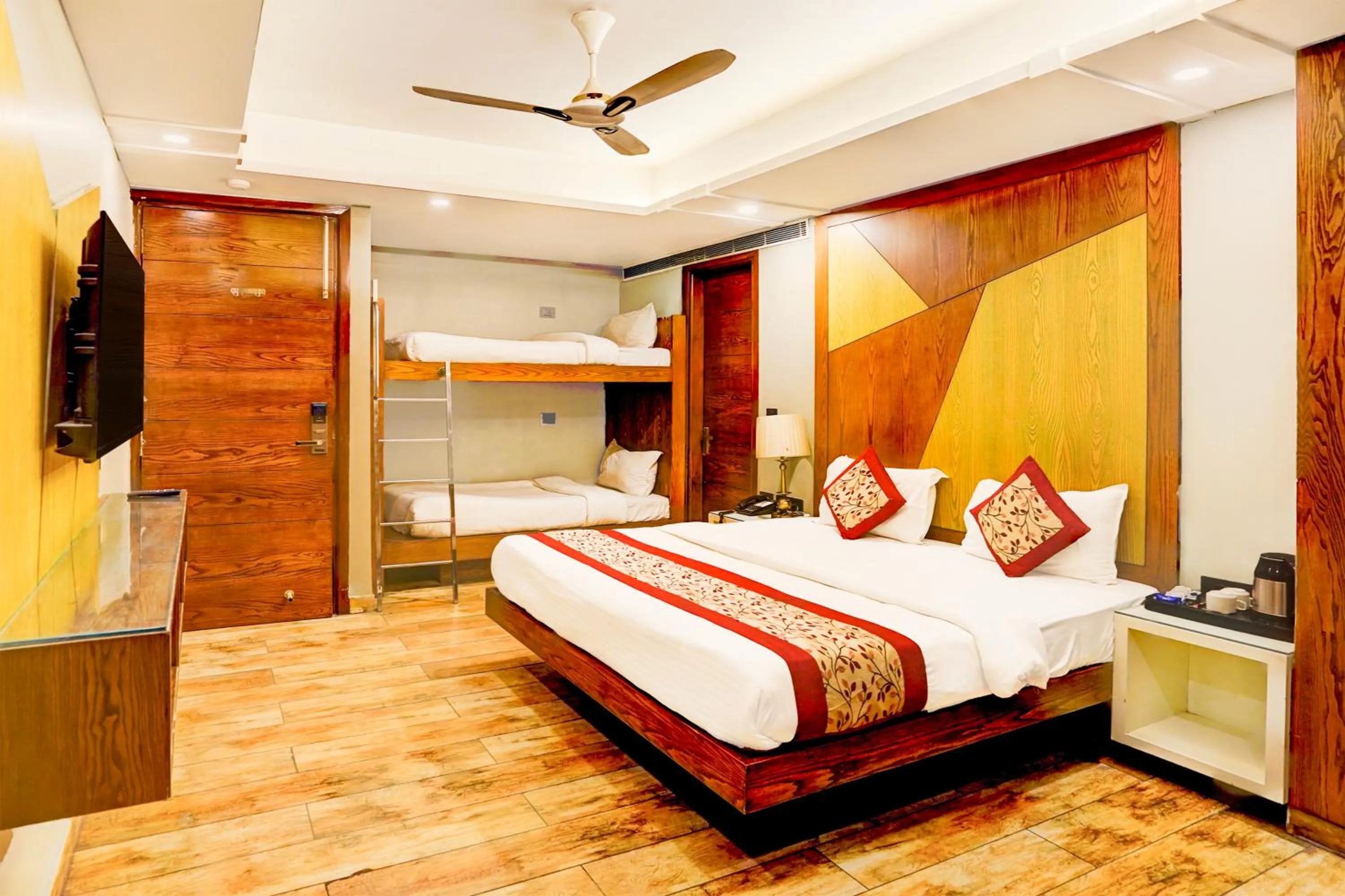 Bed in Staybook Hotel Nitya Maharani, Free Airport Pickup