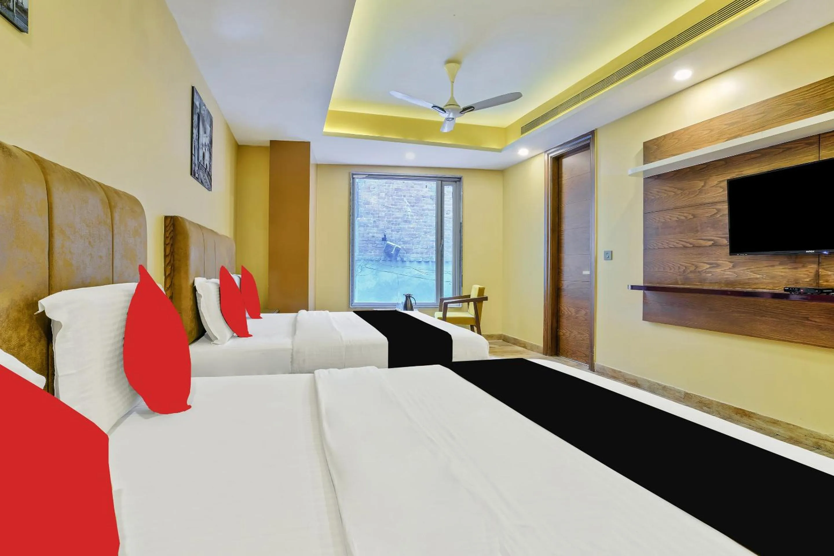 Communal lounge/ TV room, Bed in Staybook Hotel Nitya Maharani, Free Airport Pickup