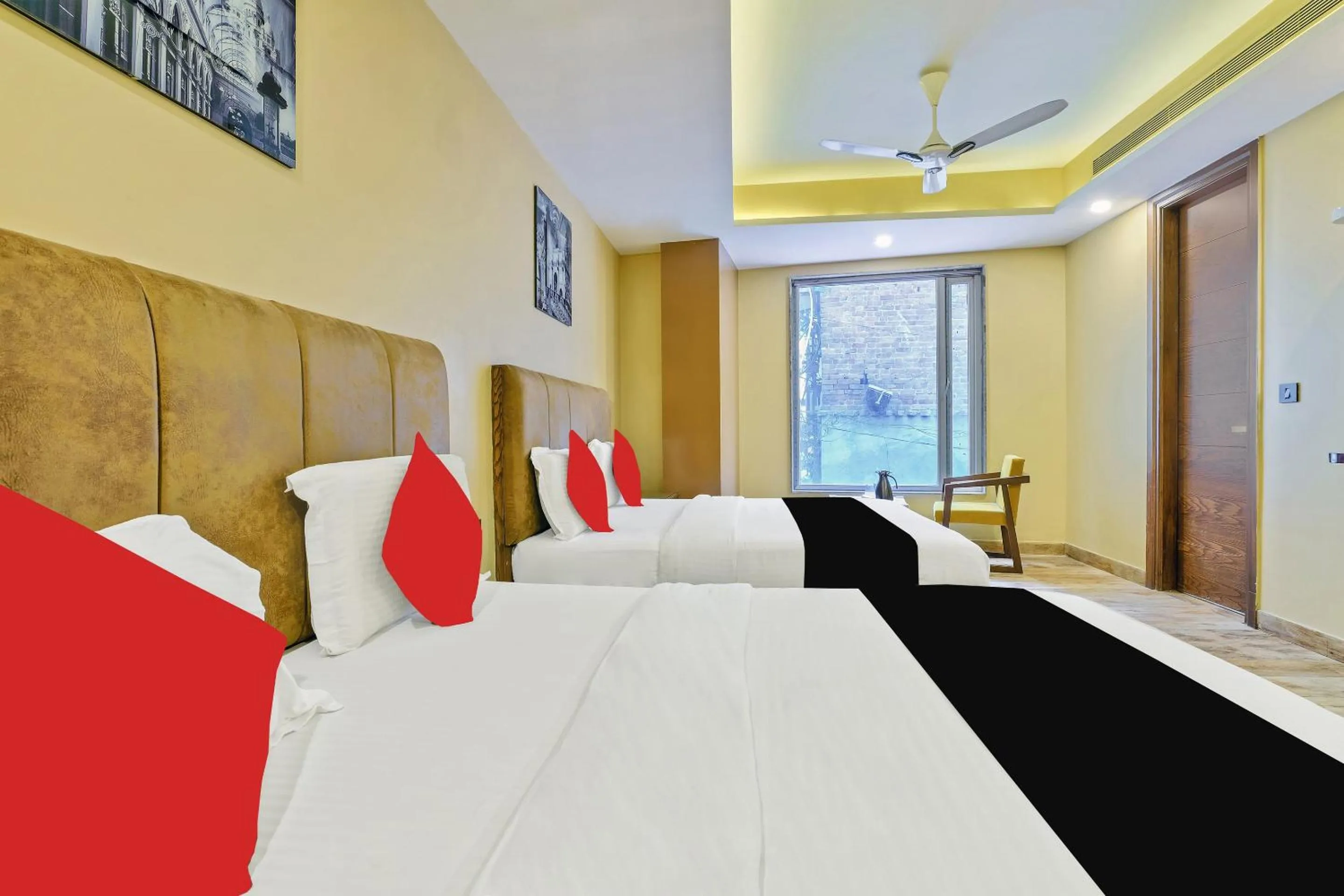 Bed in Staybook Hotel Nitya Maharani, Free Airport Pickup
