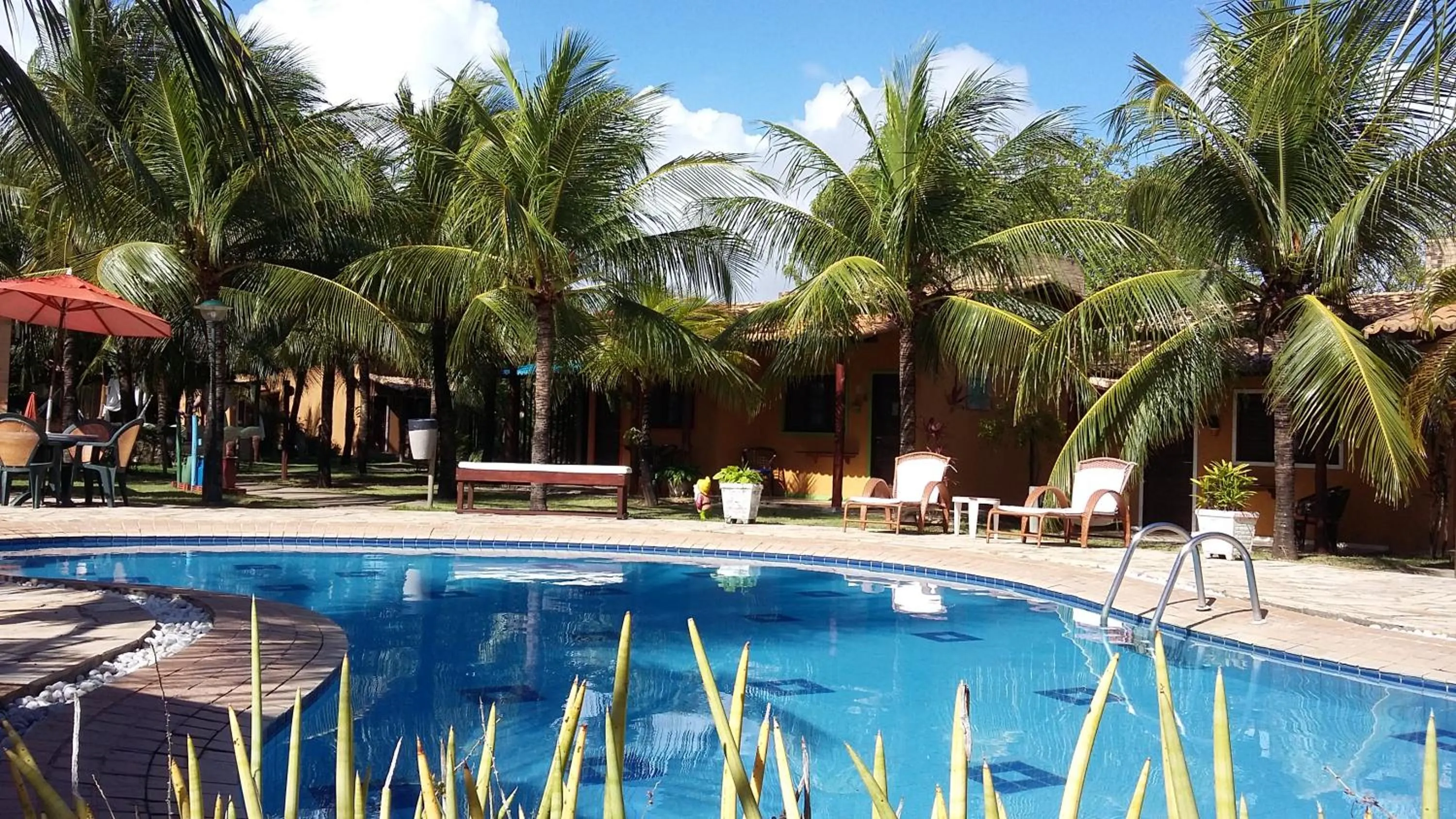 Swimming pool in Hotel Enseada Maracajaú