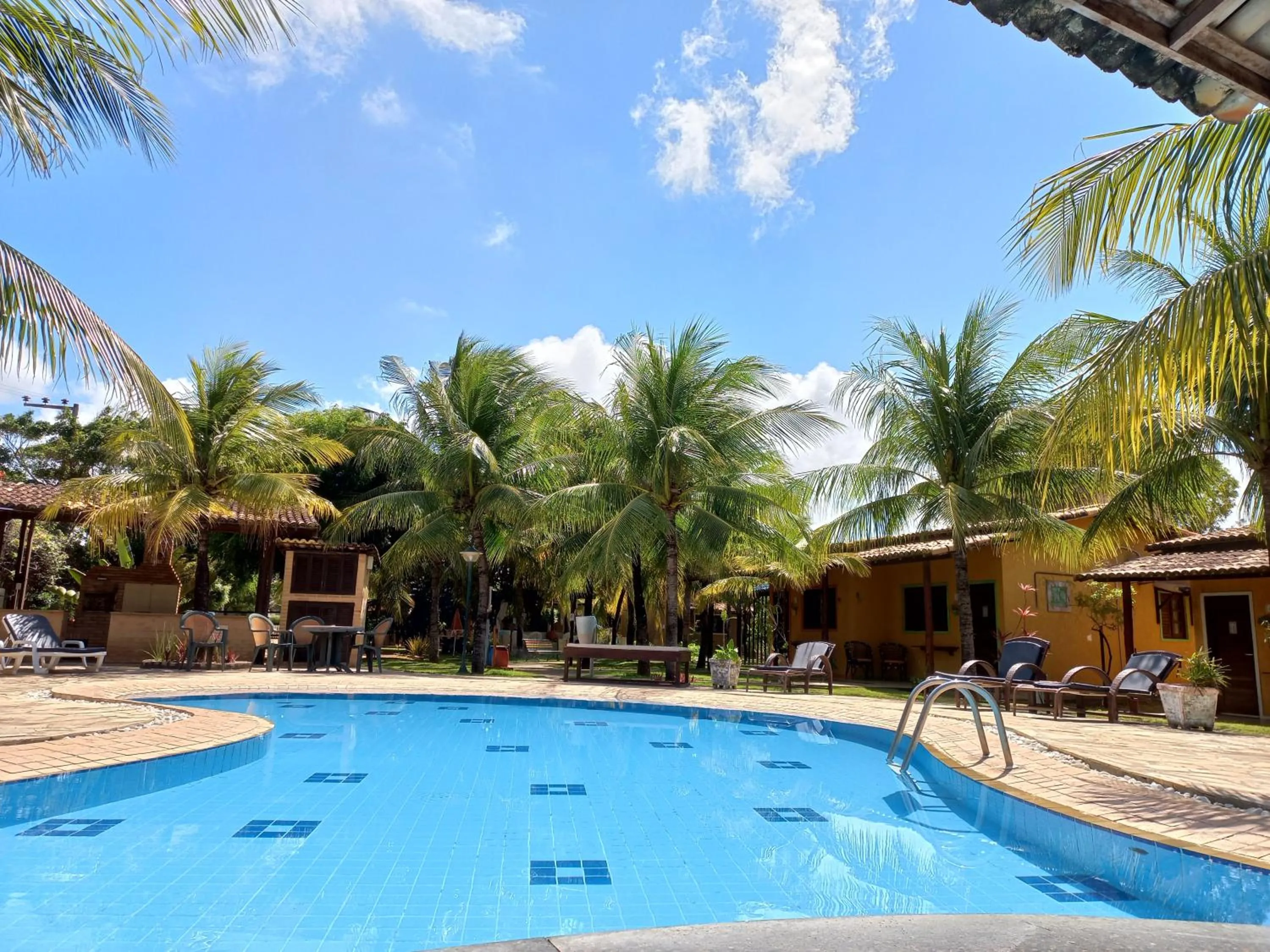 Swimming pool in Hotel Enseada Maracajaú