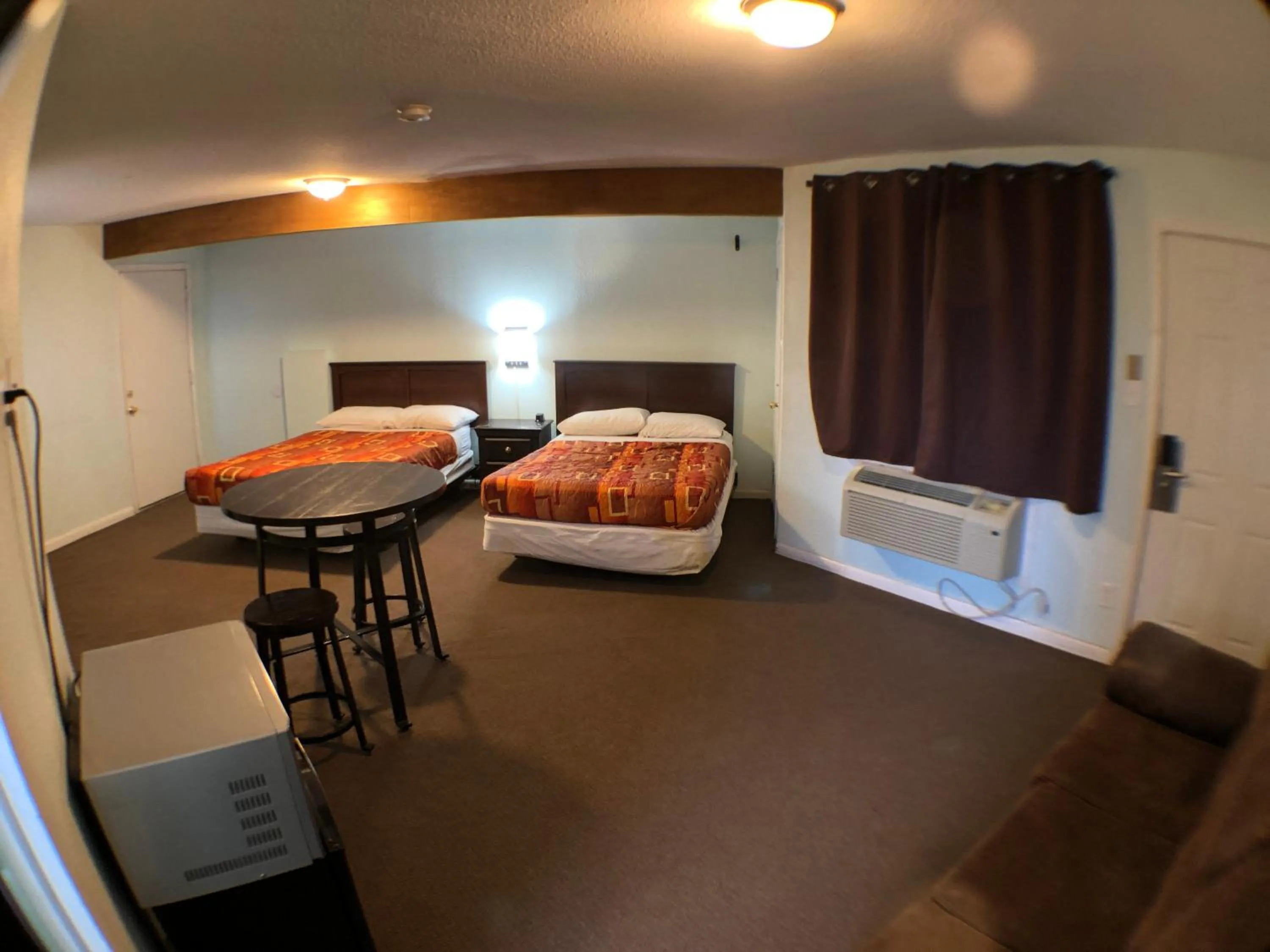 Bed in Tower 64 Motel & RV