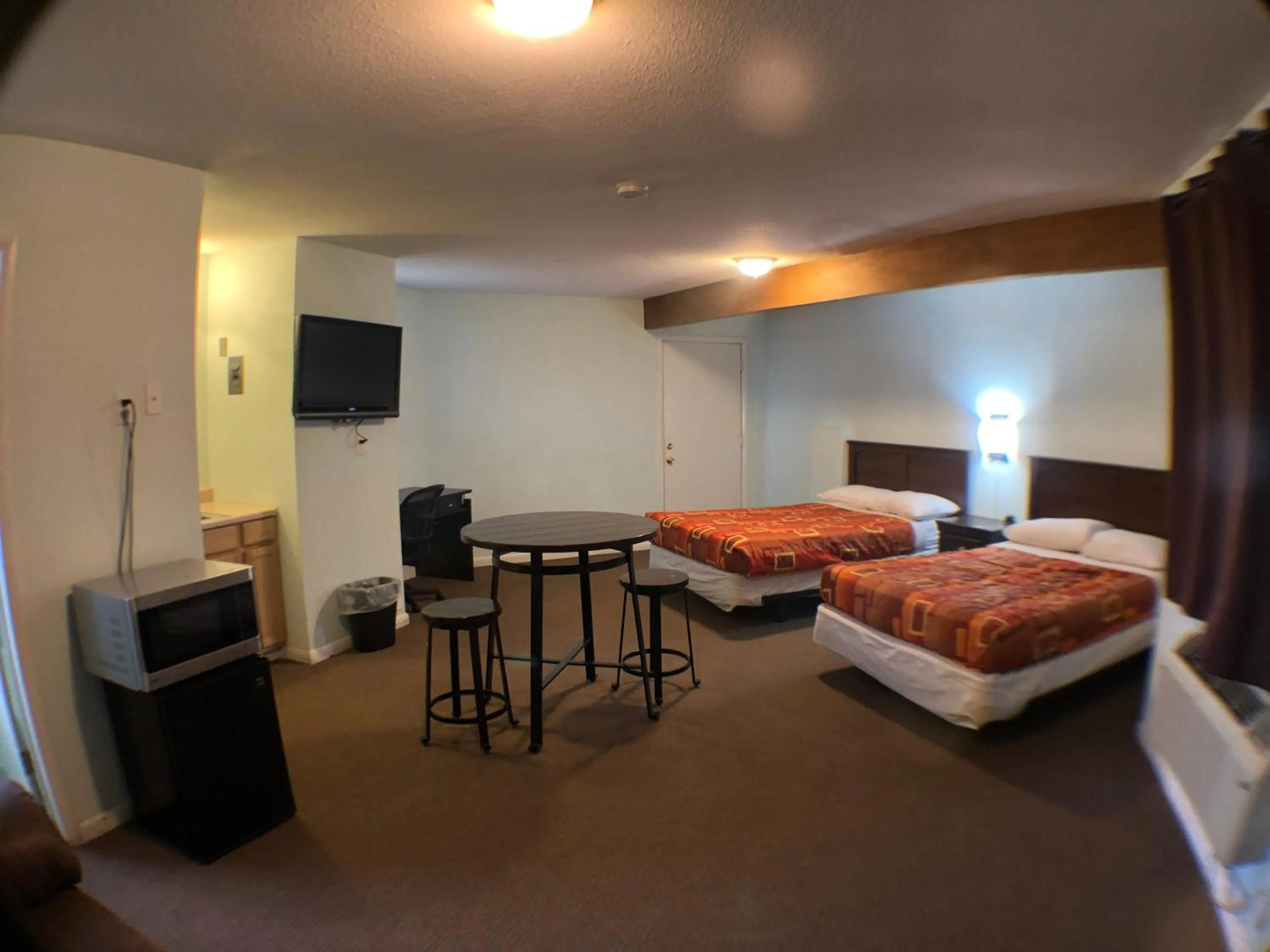 Bed in Tower 64 Motel & RV