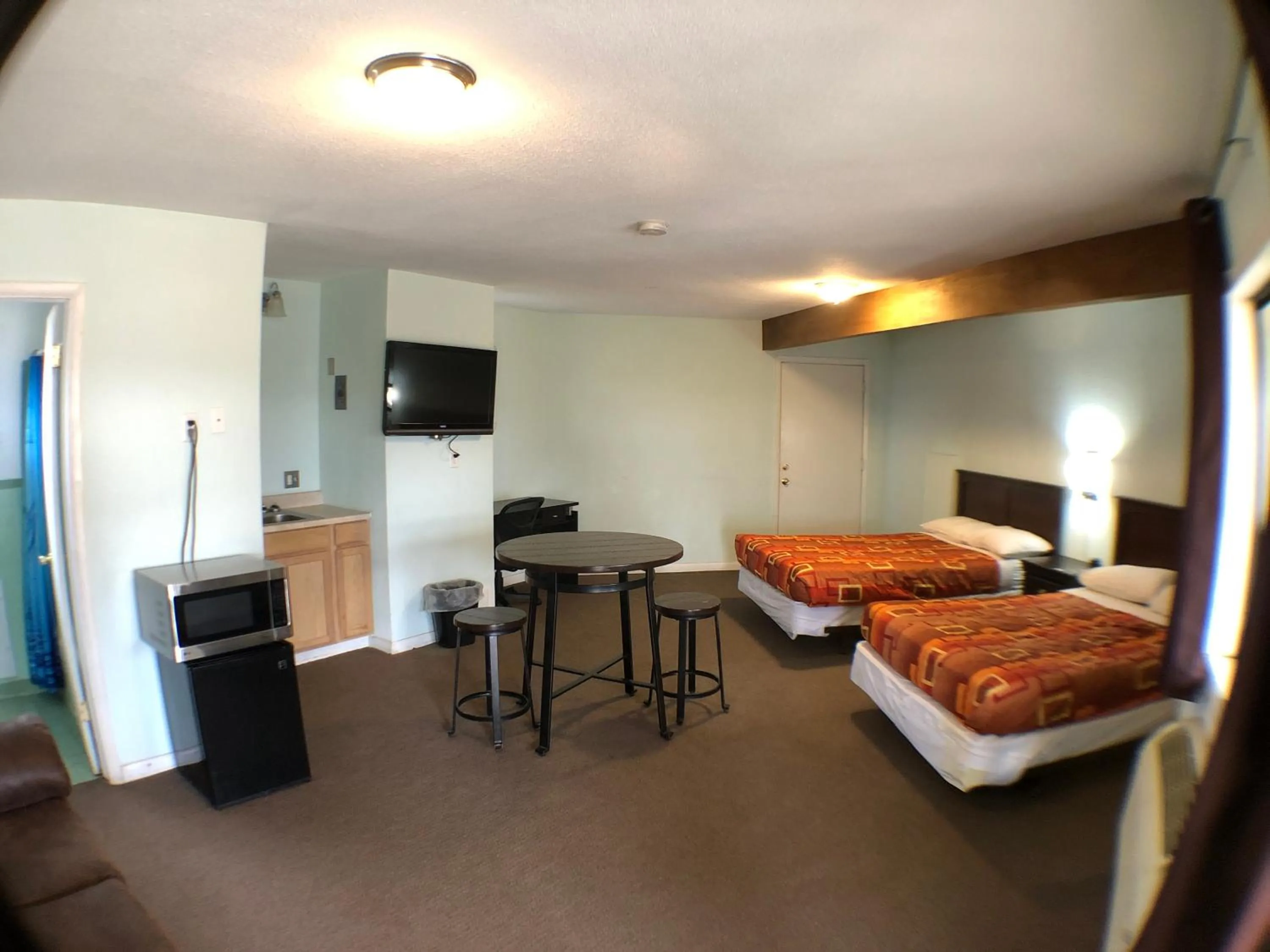 Bed in Tower 64 Motel & RV