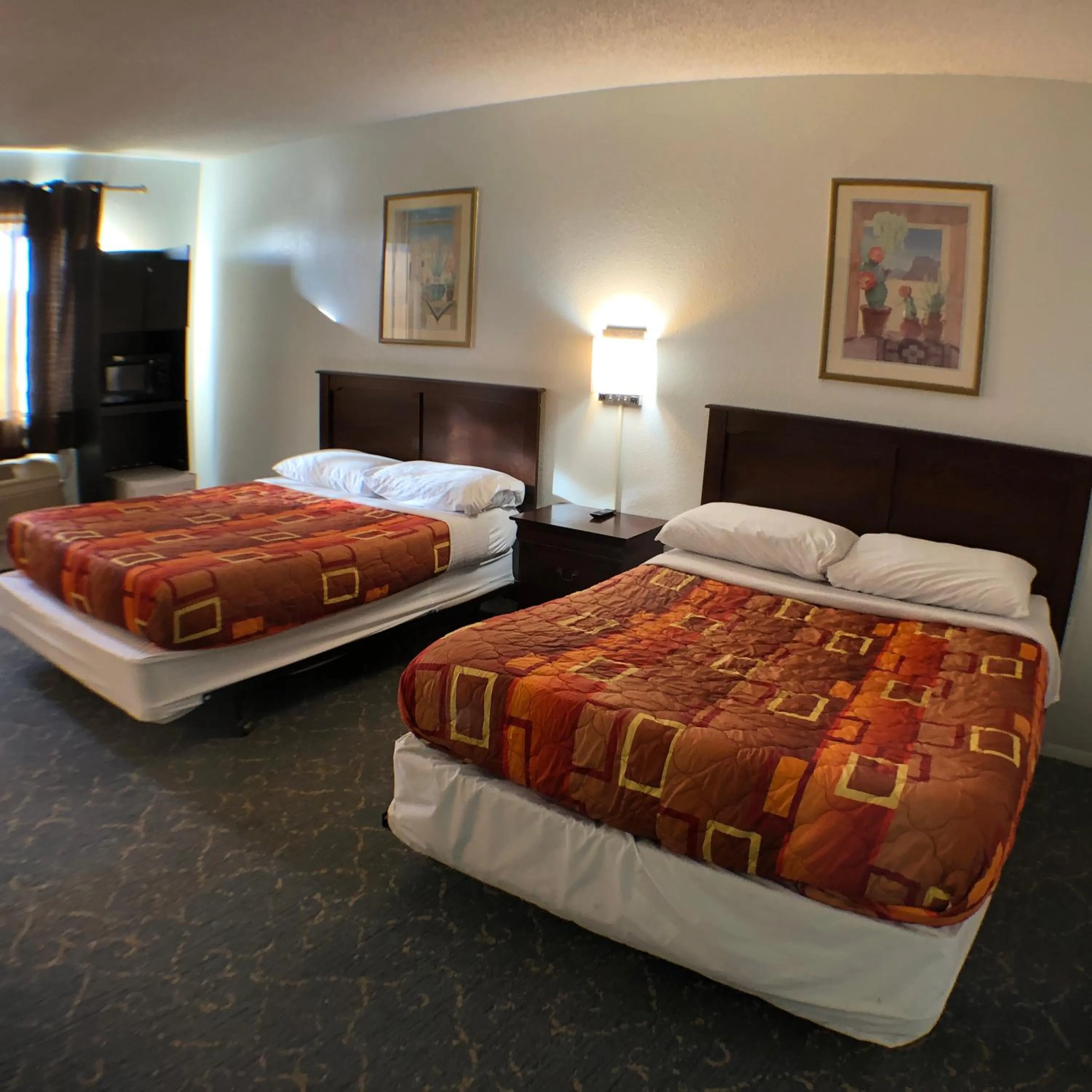 Bed in Tower 64 Motel & RV