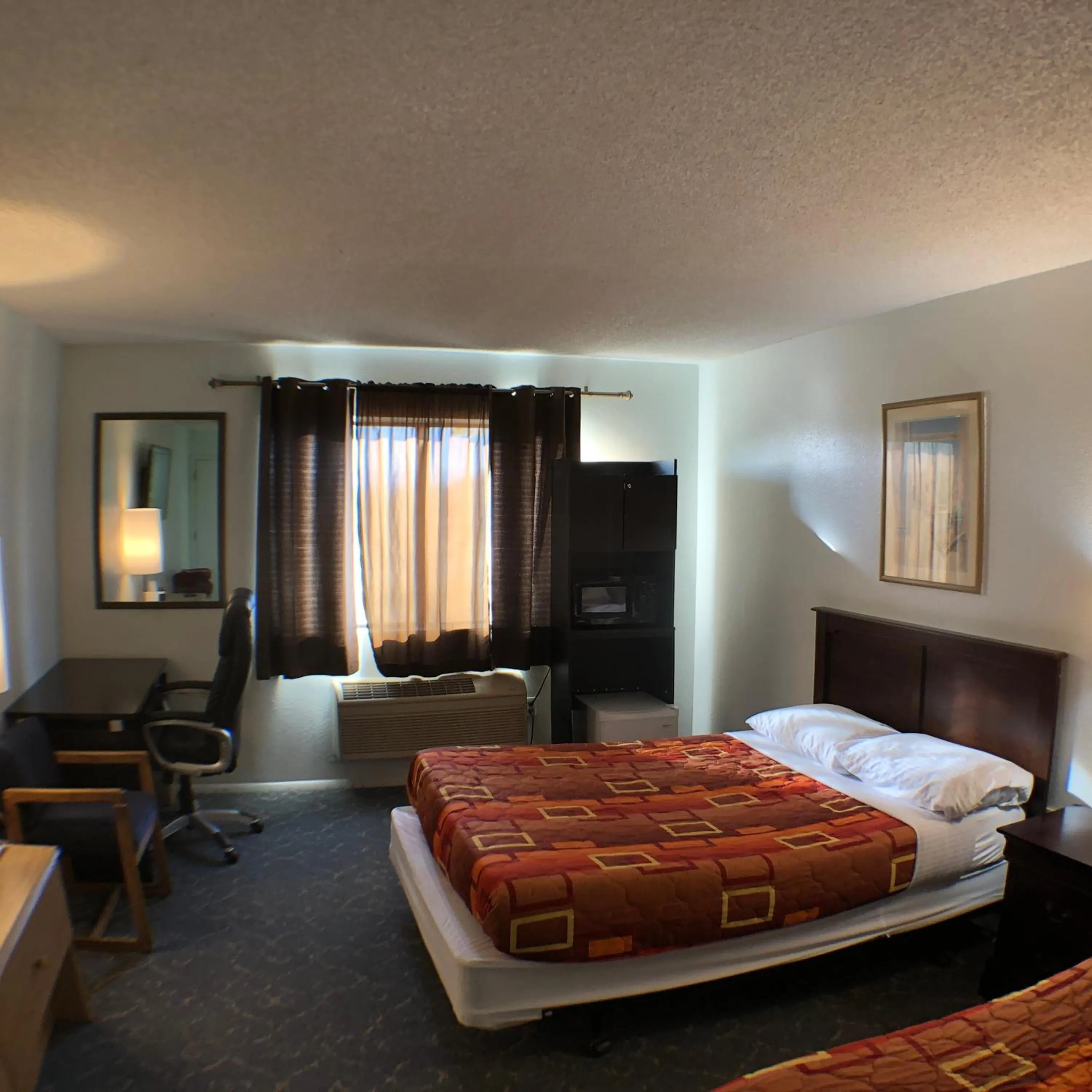 Bed in Tower 64 Motel & RV