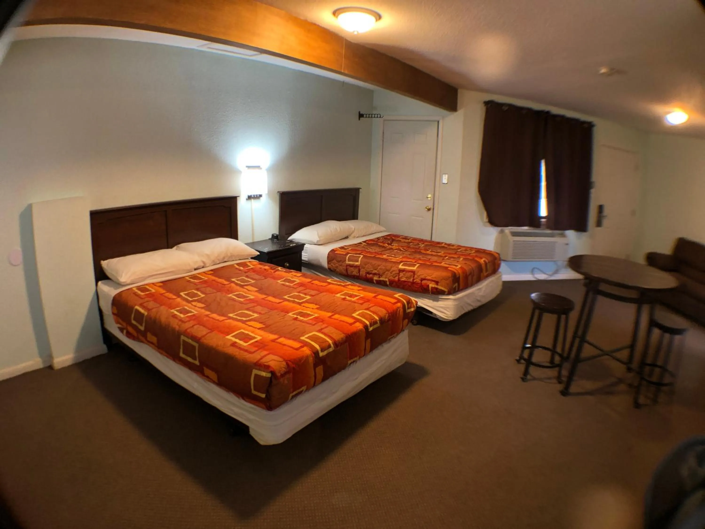 Bed in Tower 64 Motel & RV