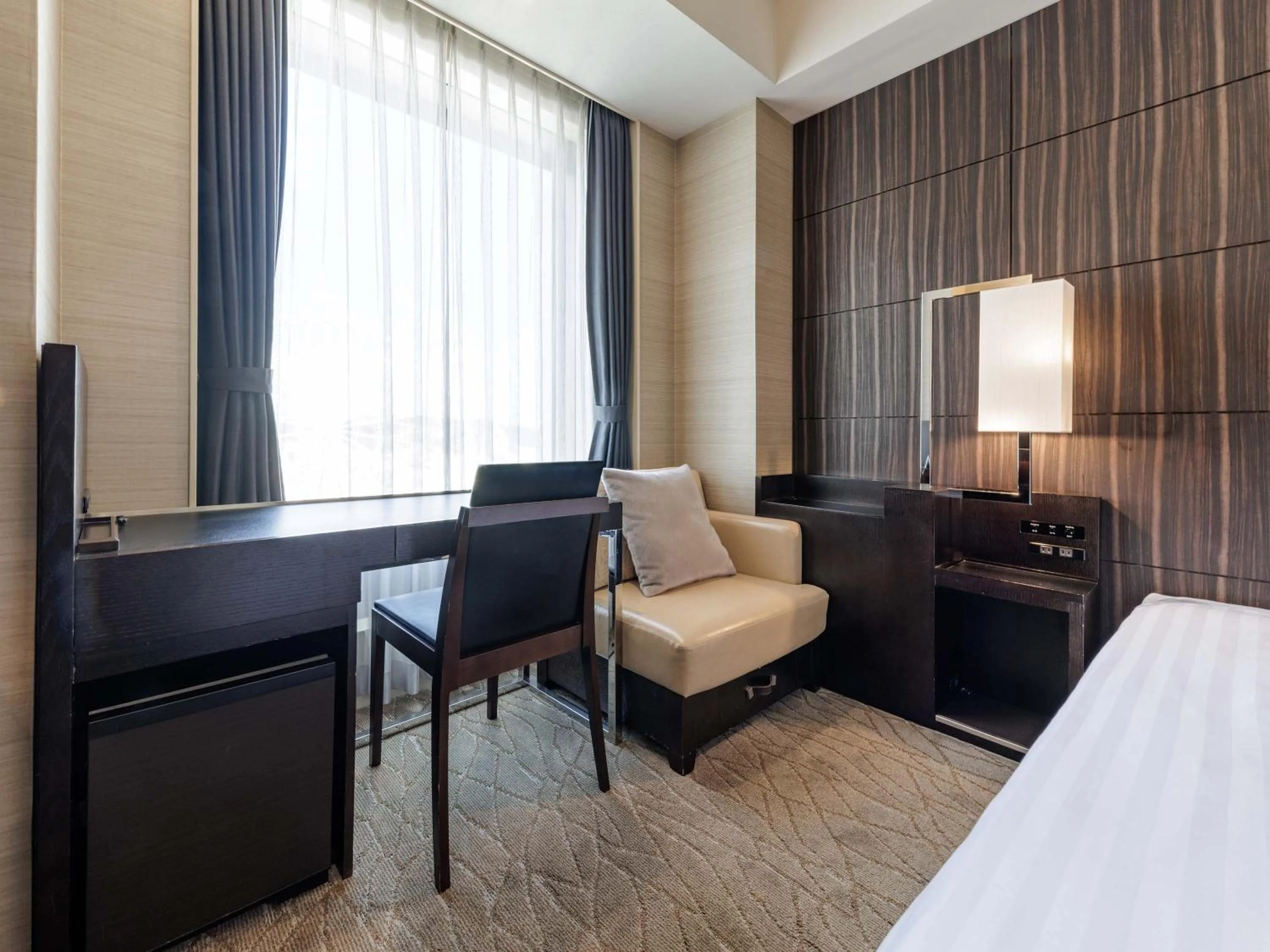 Photo of the whole room, Bed in Solaria Nishitetsu Hotel Kagoshima