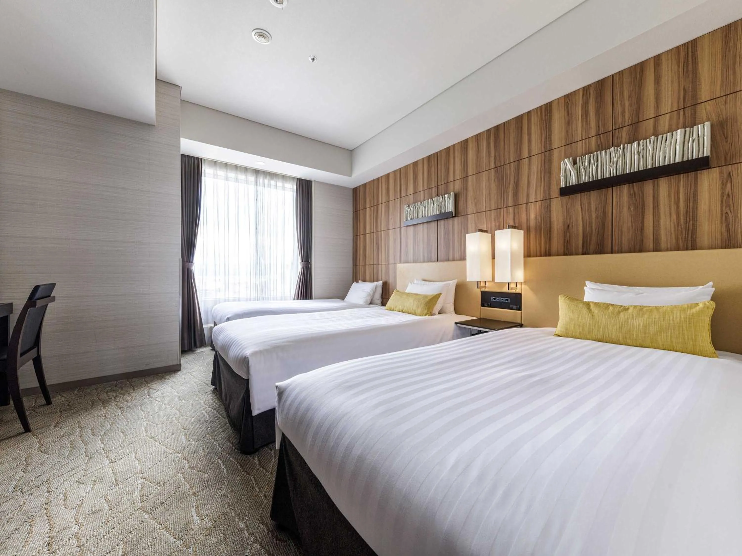 Photo of the whole room, Bed in Solaria Nishitetsu Hotel Kagoshima