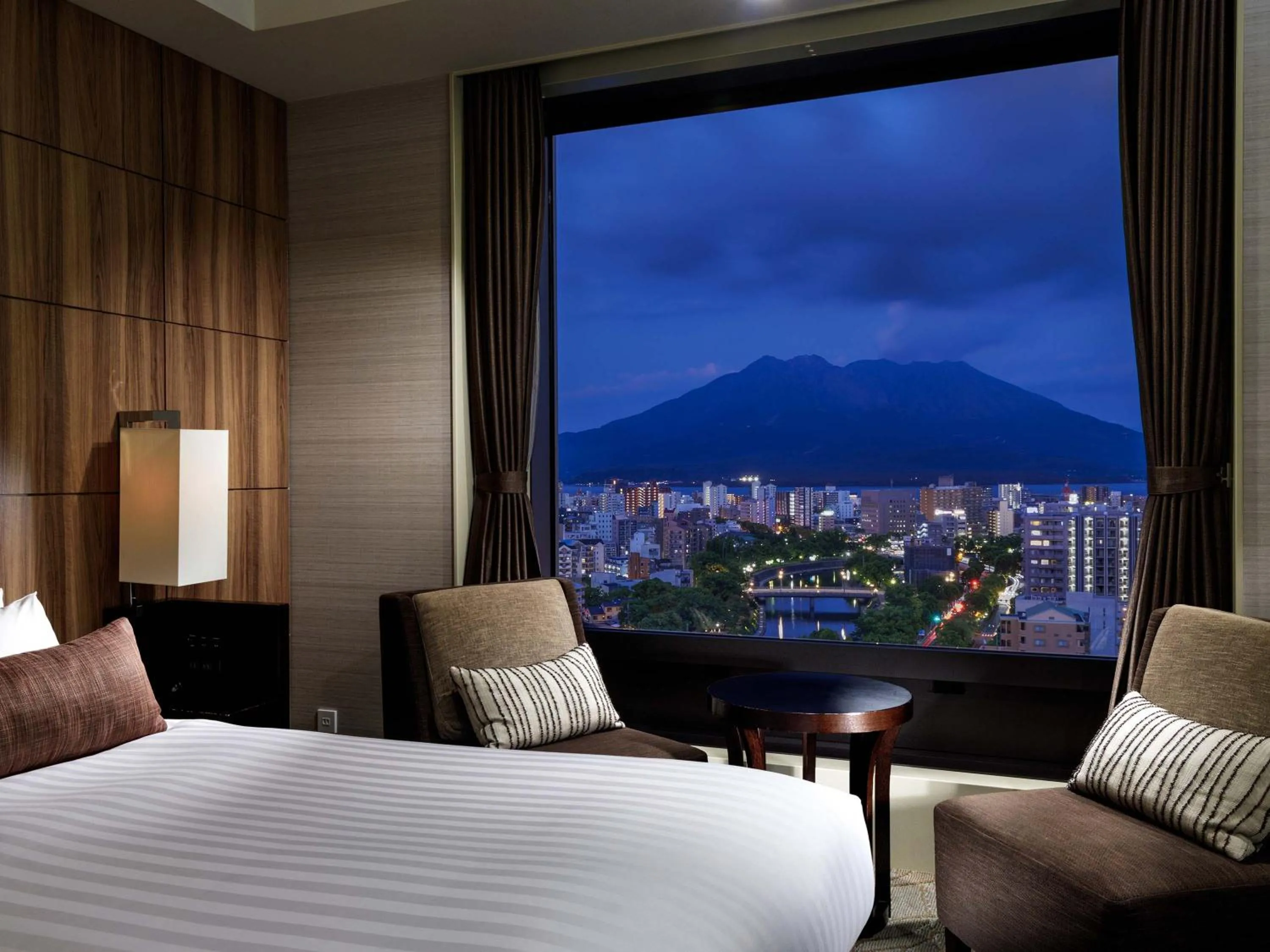 Photo of the whole room, Bed in Solaria Nishitetsu Hotel Kagoshima
