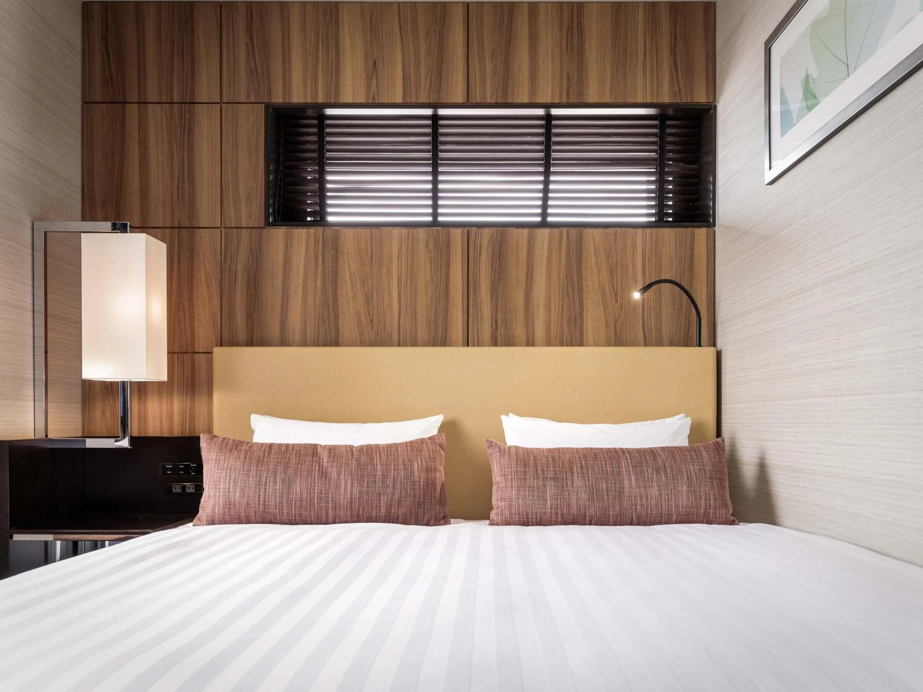 Photo of the whole room, Bed in Solaria Nishitetsu Hotel Kagoshima