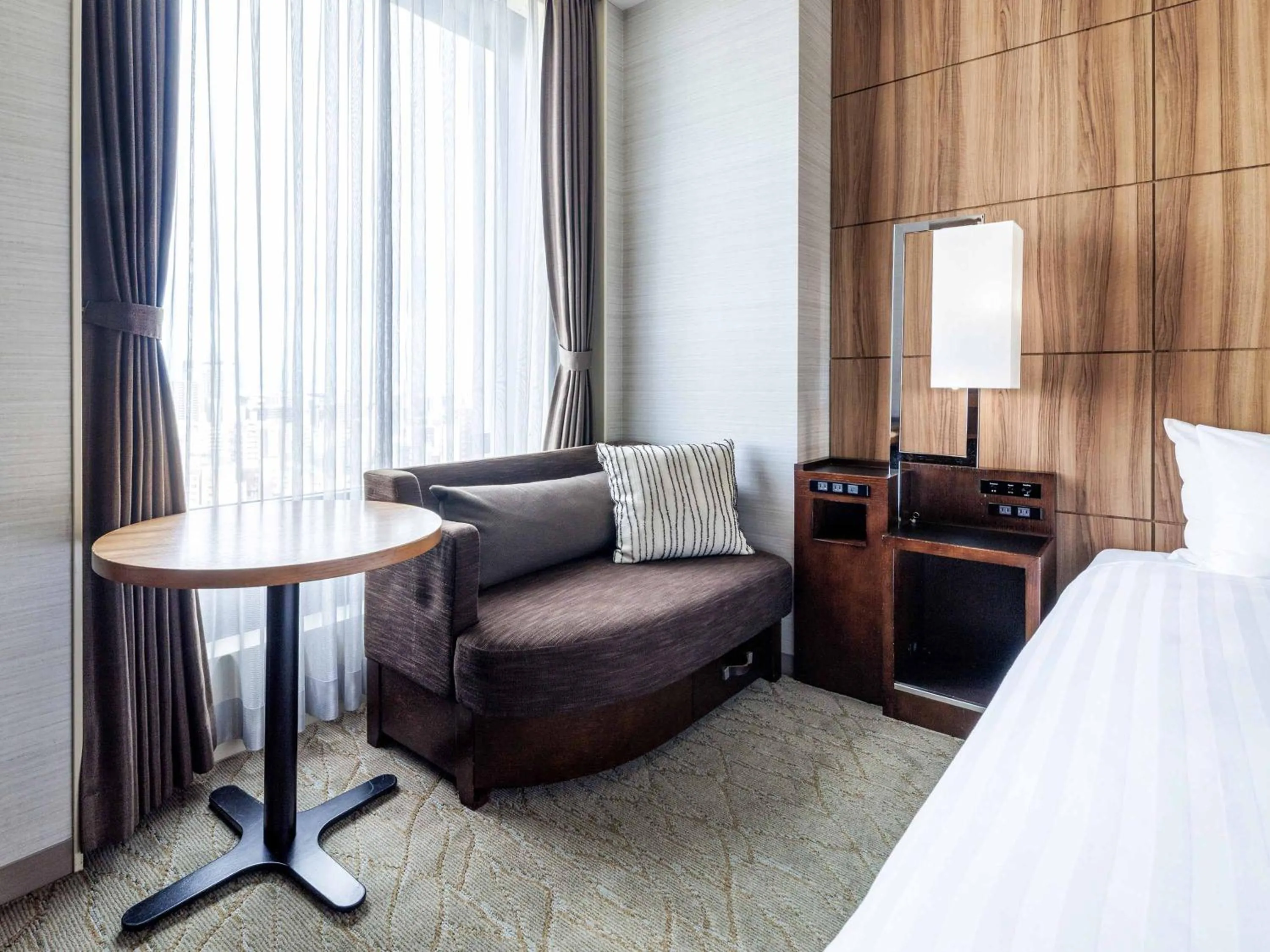 Photo of the whole room, Bed in Solaria Nishitetsu Hotel Kagoshima