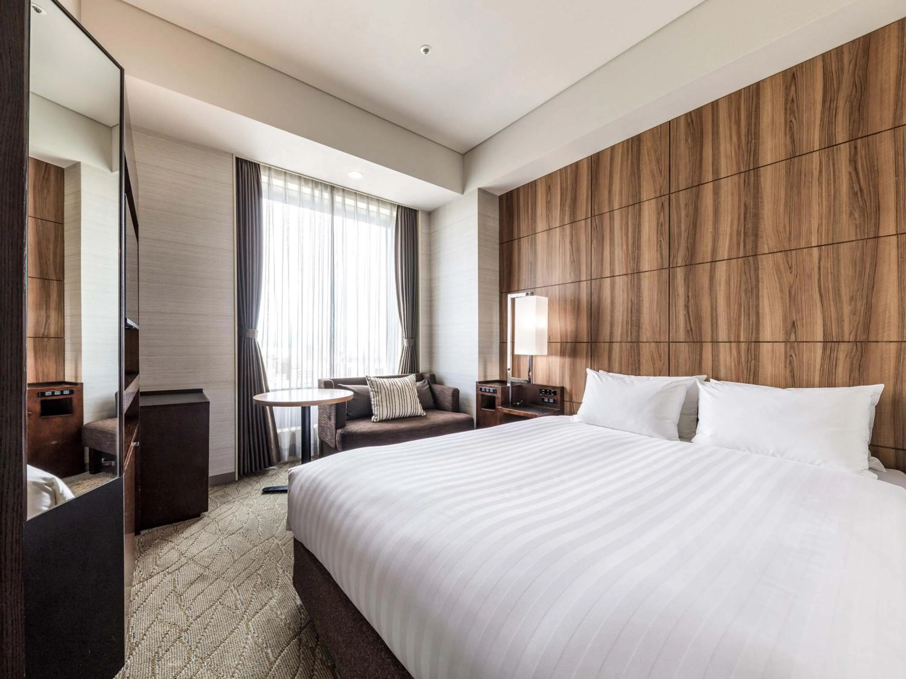 Photo of the whole room, Bed in Solaria Nishitetsu Hotel Kagoshima