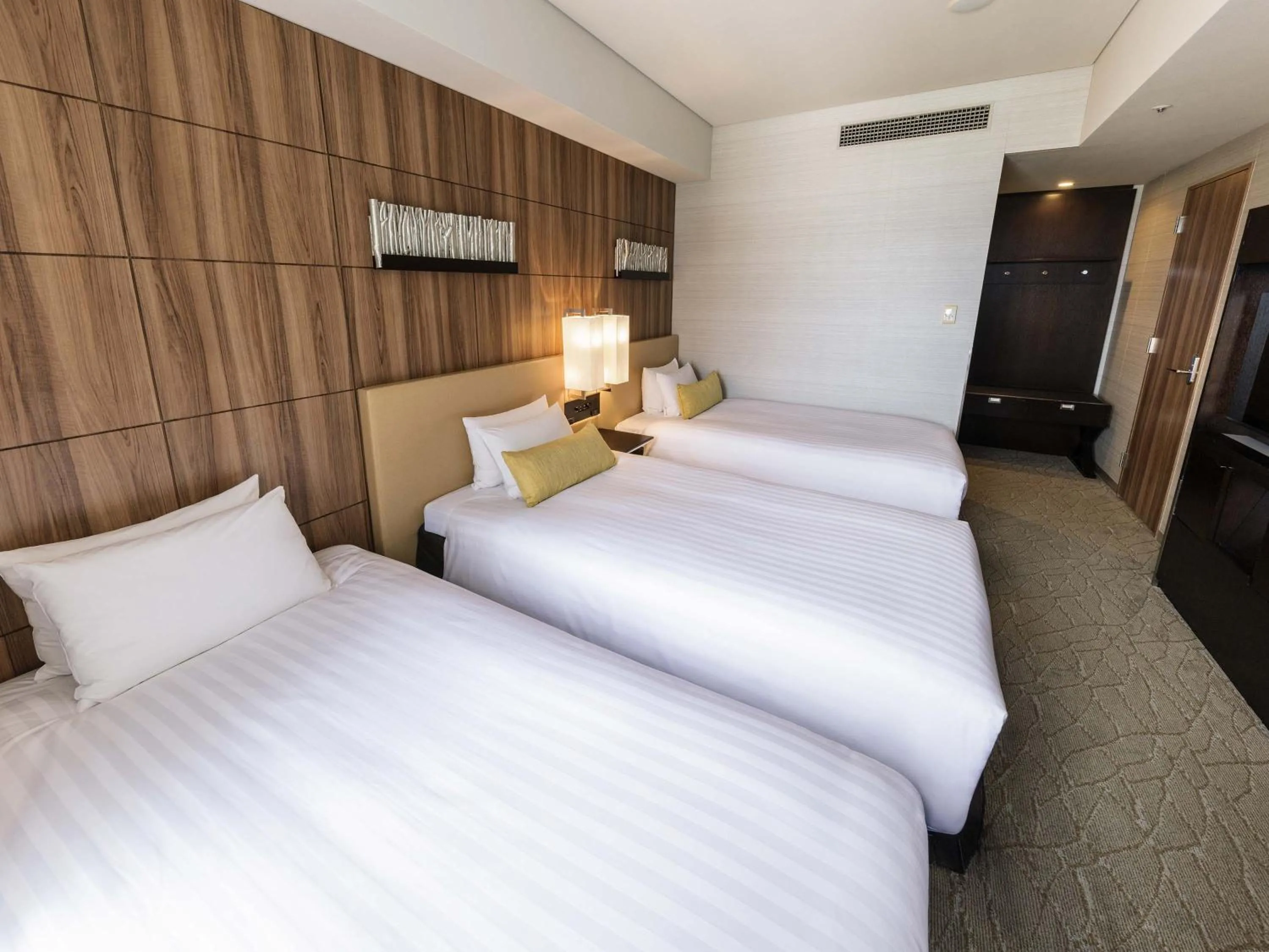 Photo of the whole room, Bed in Solaria Nishitetsu Hotel Kagoshima