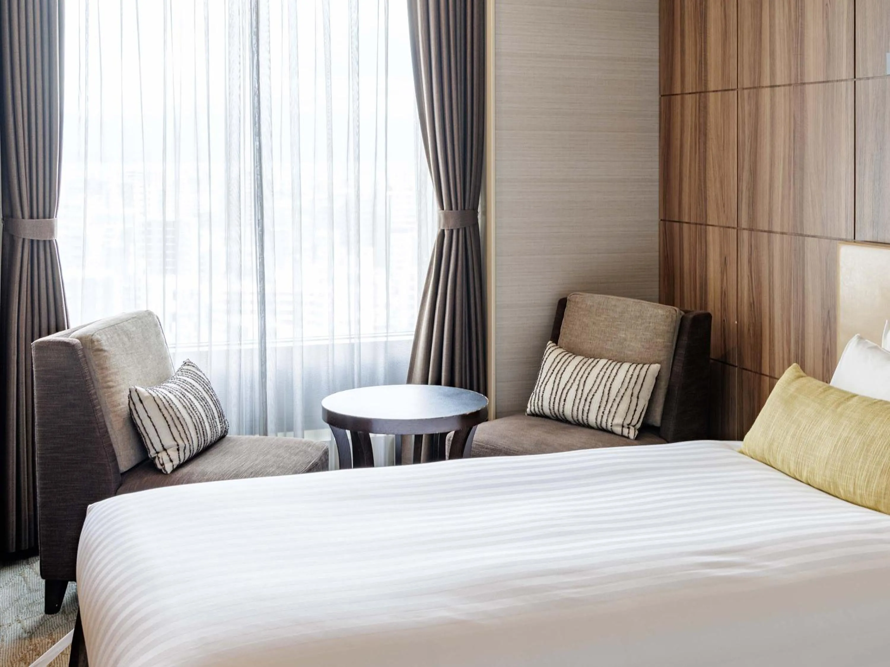 Photo of the whole room, Bed in Solaria Nishitetsu Hotel Kagoshima