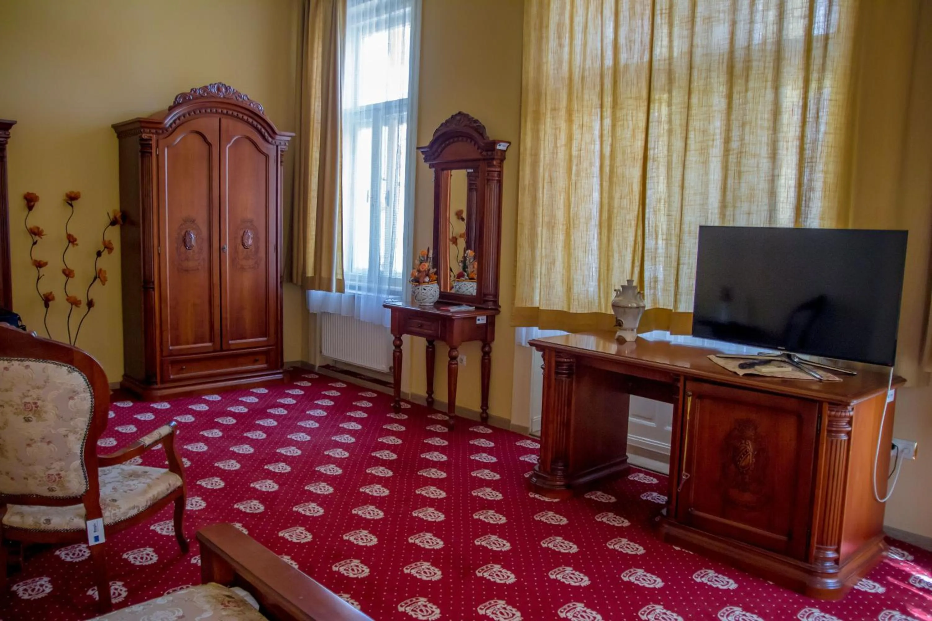 Communal lounge/ TV room in Hotel Astoria