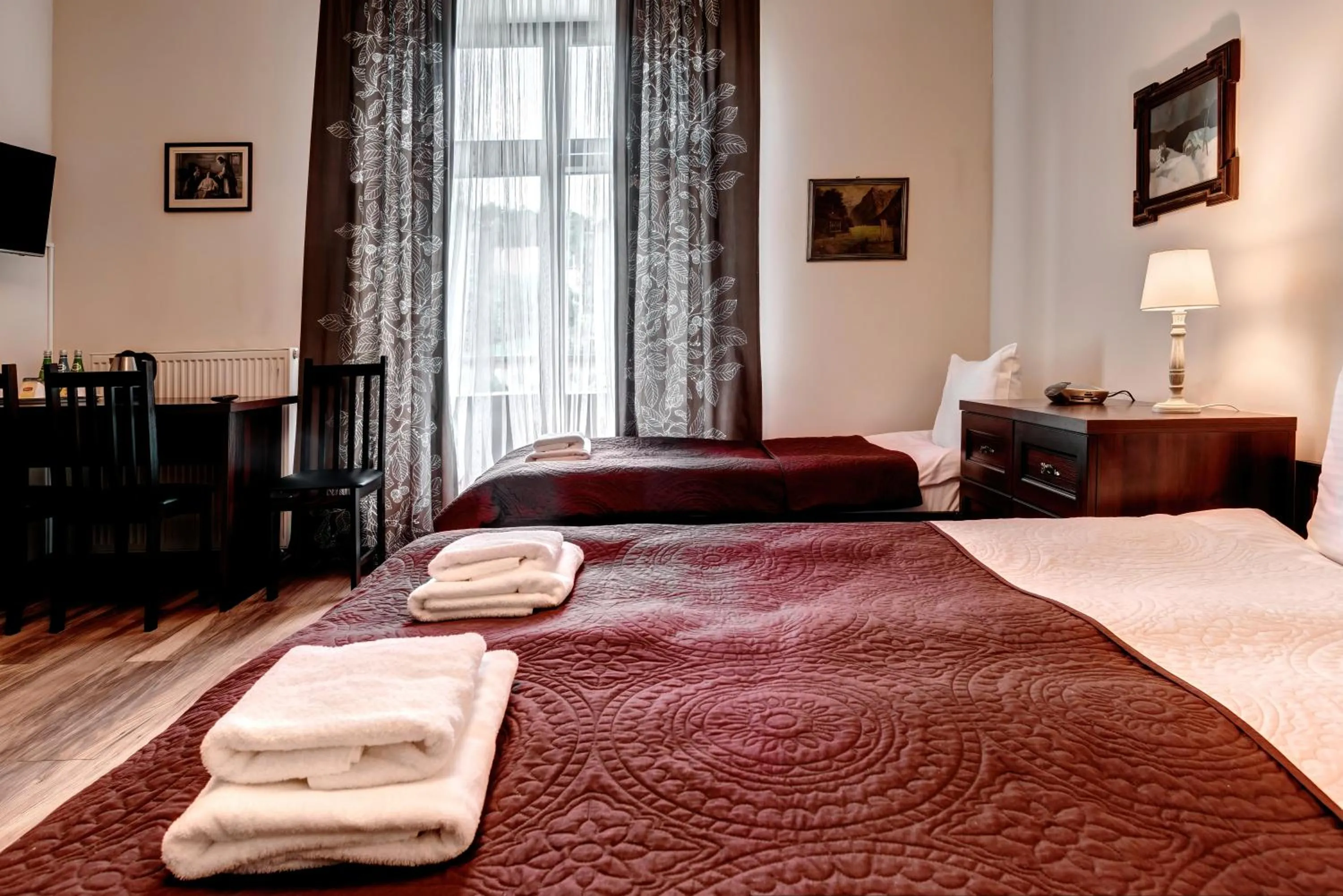 Bed in Hotel Charlotta