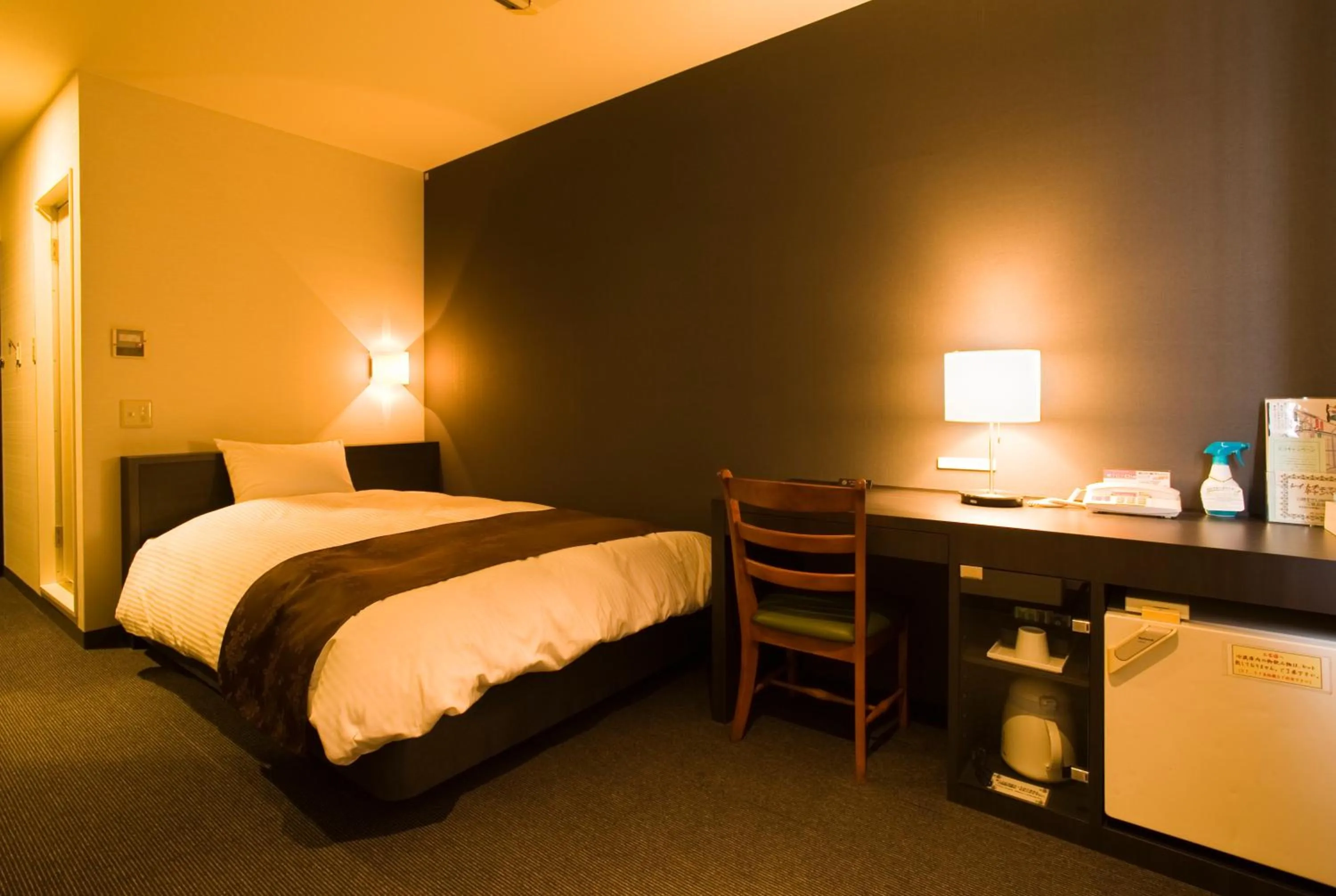 Bed in Hotel Taisei Annex