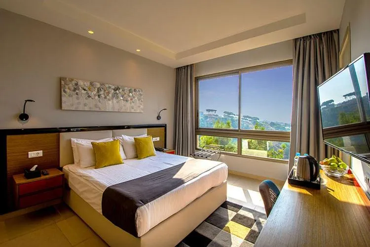 Bed in The Ray Hotel and Studios