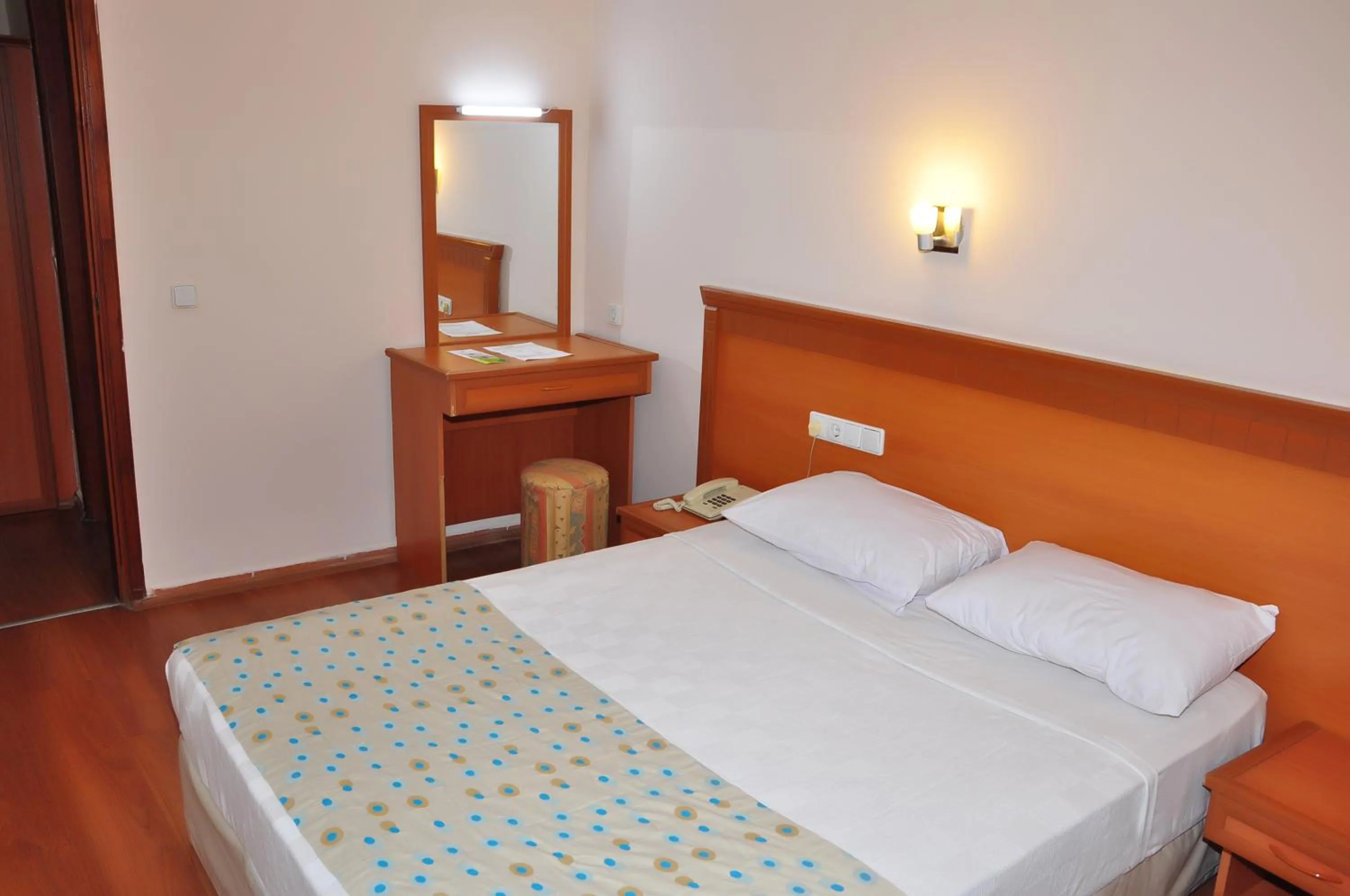 Bed in Cinar Family Suite Hotel