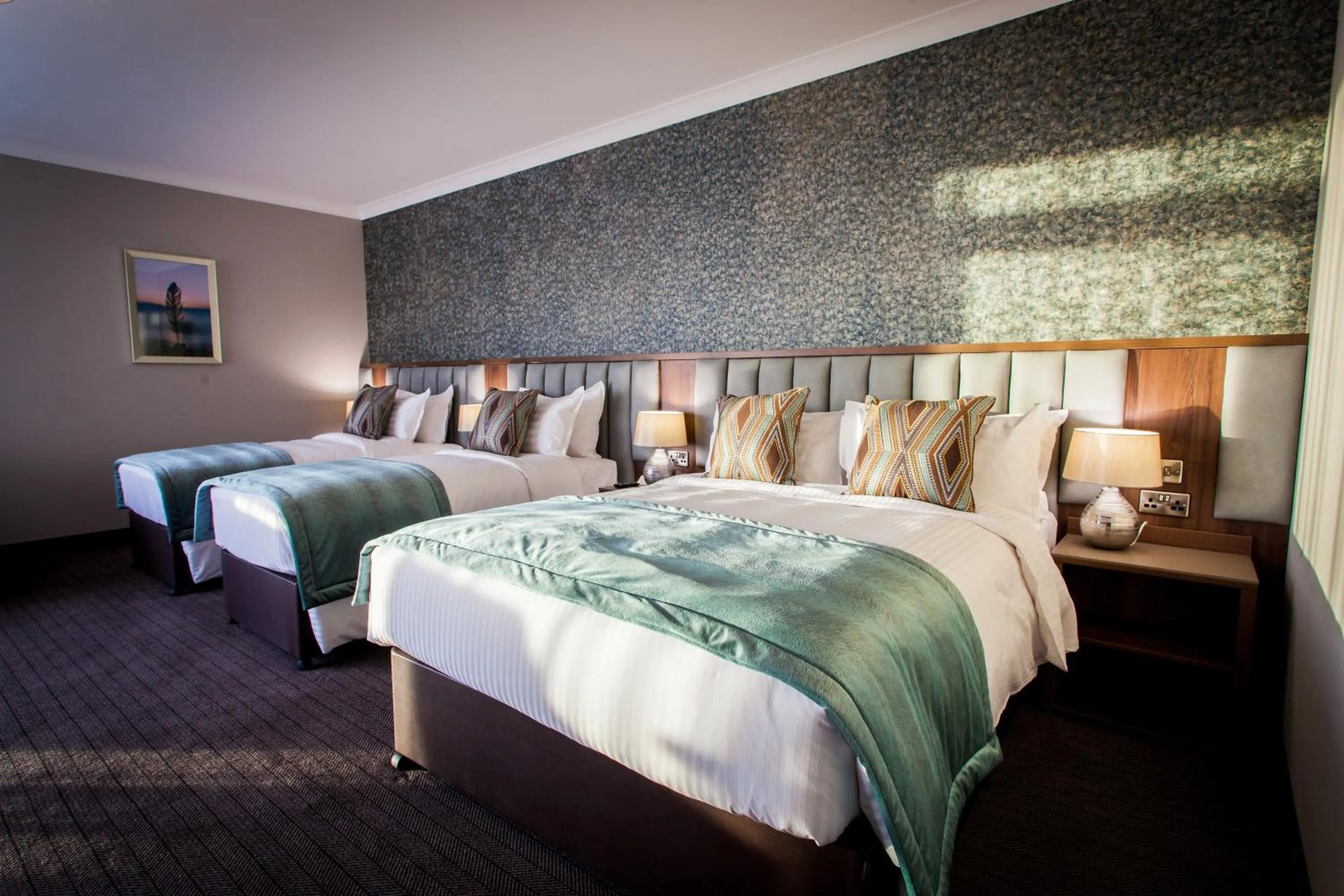 Bed in Amber Springs Hotel