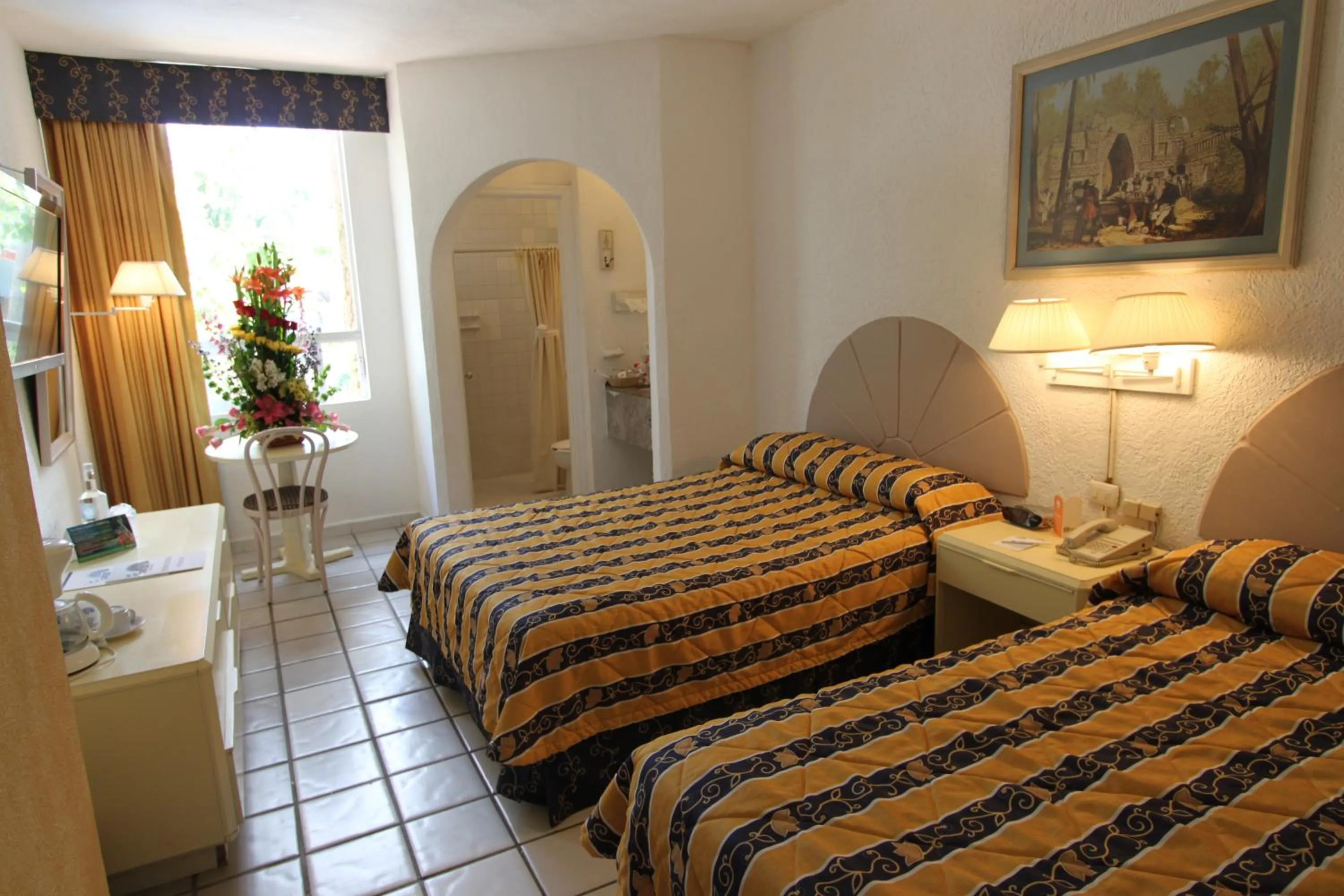 Bed in Hotel Plaza Caribe