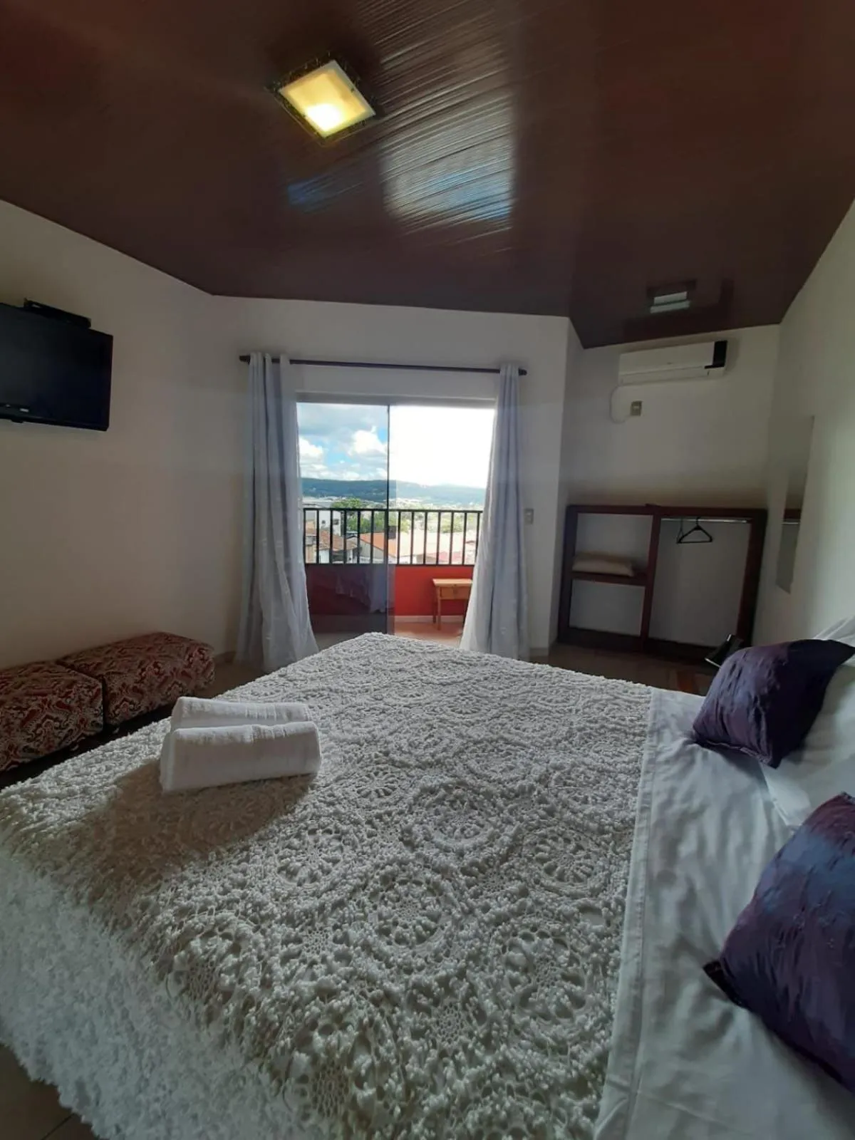 Bed in Pousada Ikabana