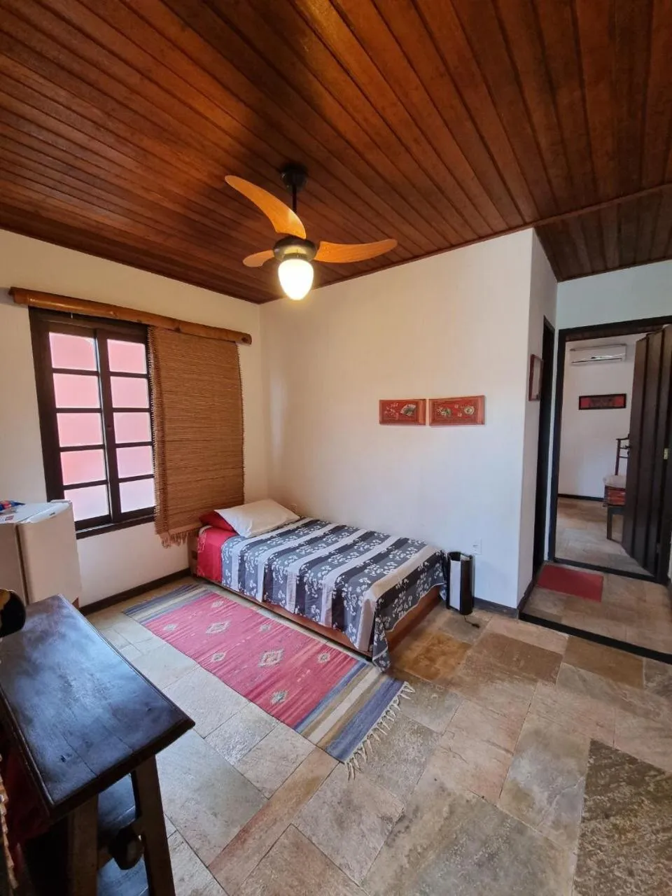 Bed in Pousada Ikabana