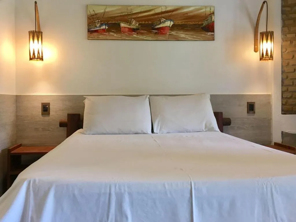 Bed in Pousada El Capitan