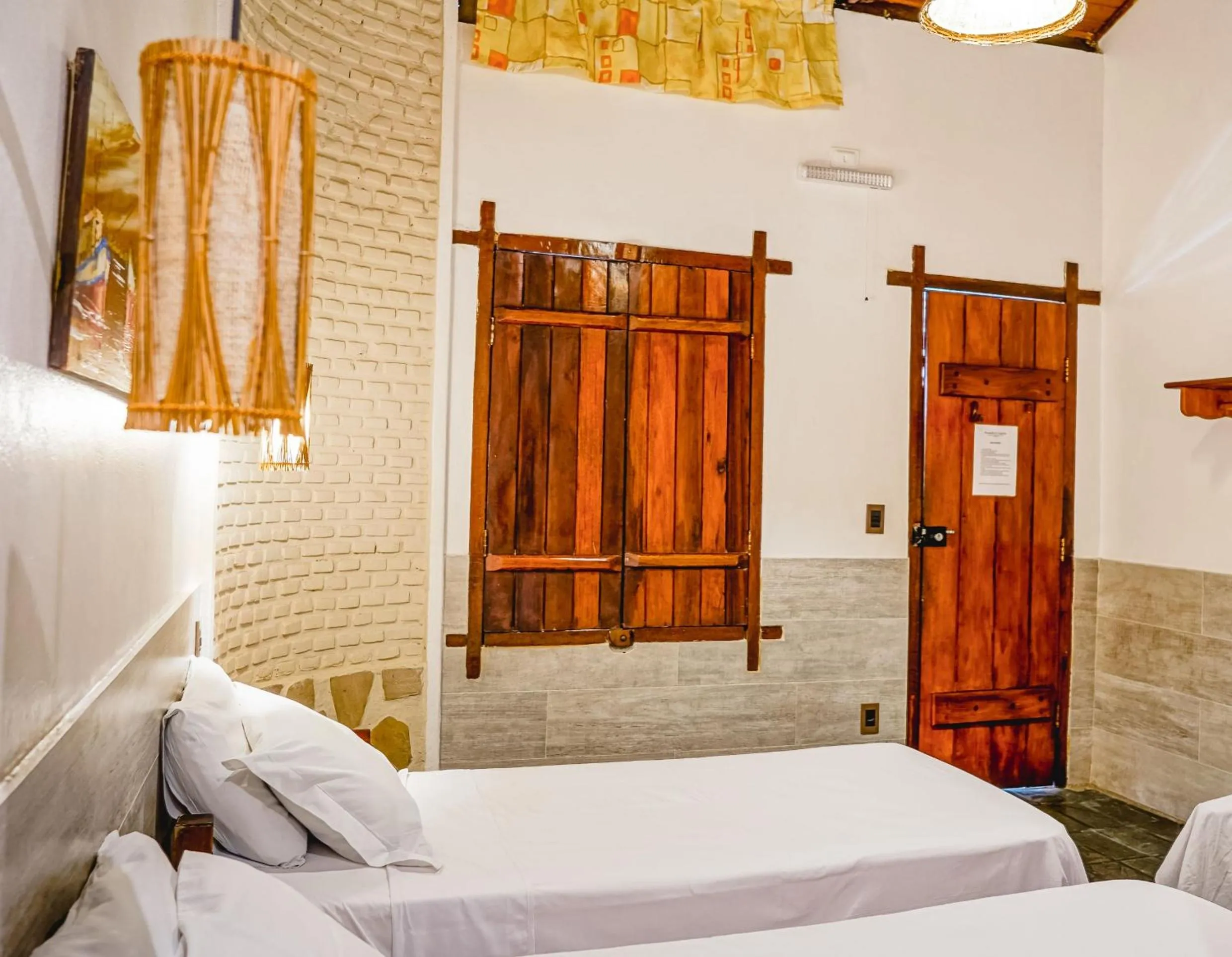 Bed in Pousada El Capitan