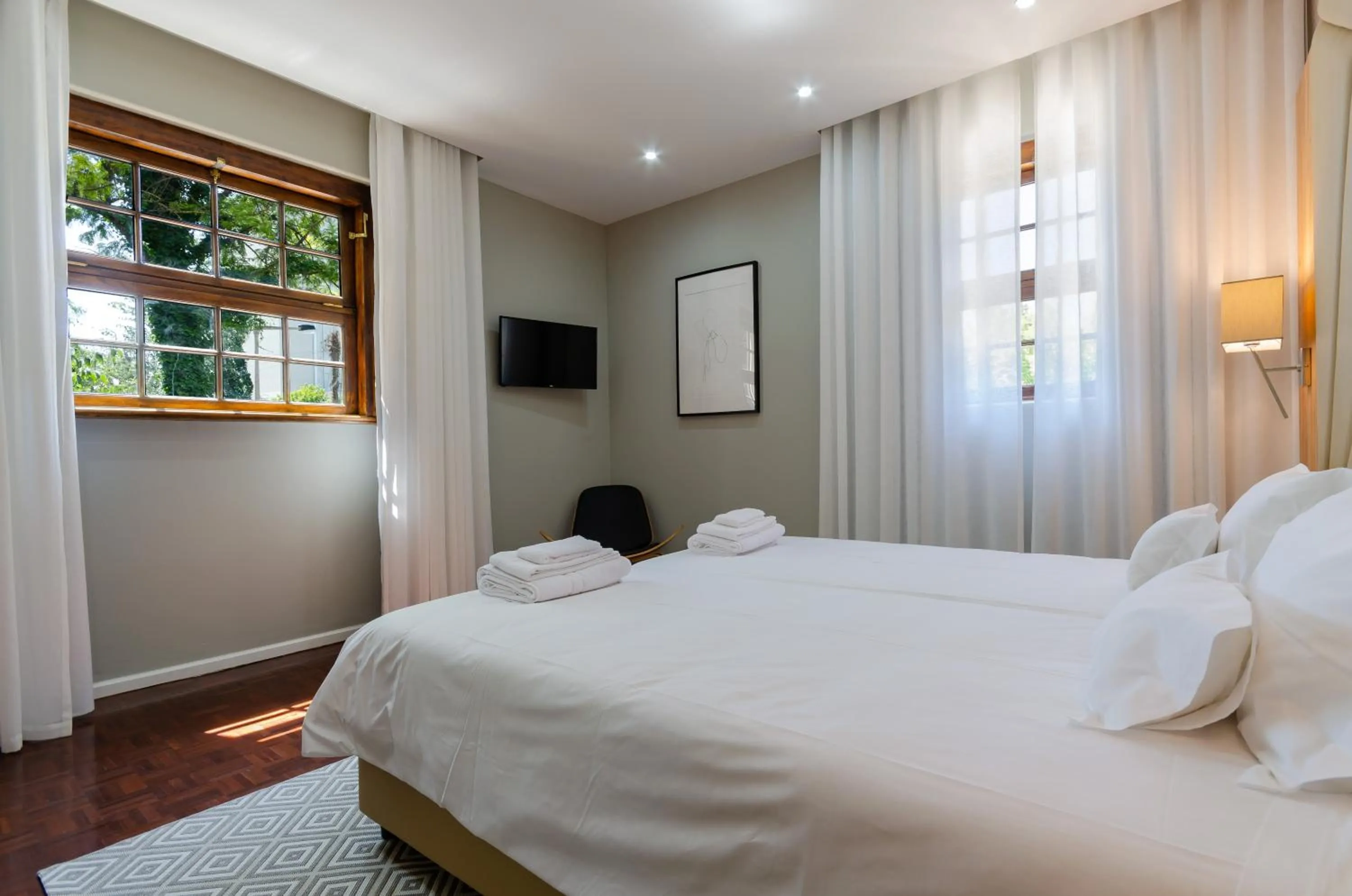 Bed in Le Jardin Lisbon