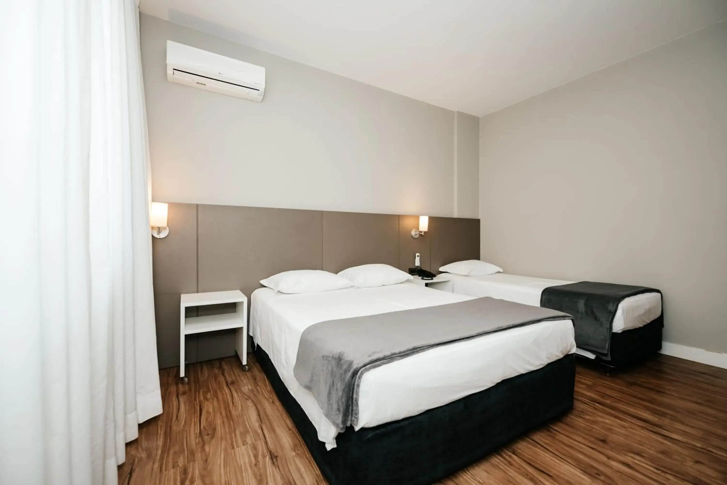 Deluxe Triple Room with 1 Double Bed and 1 Single Bed - single occupancy in Hotel Himmelblau Deluxe Triple Room with 1 Double Bed and 1 Single Bed - single occupancy in Hotel Himmelblau