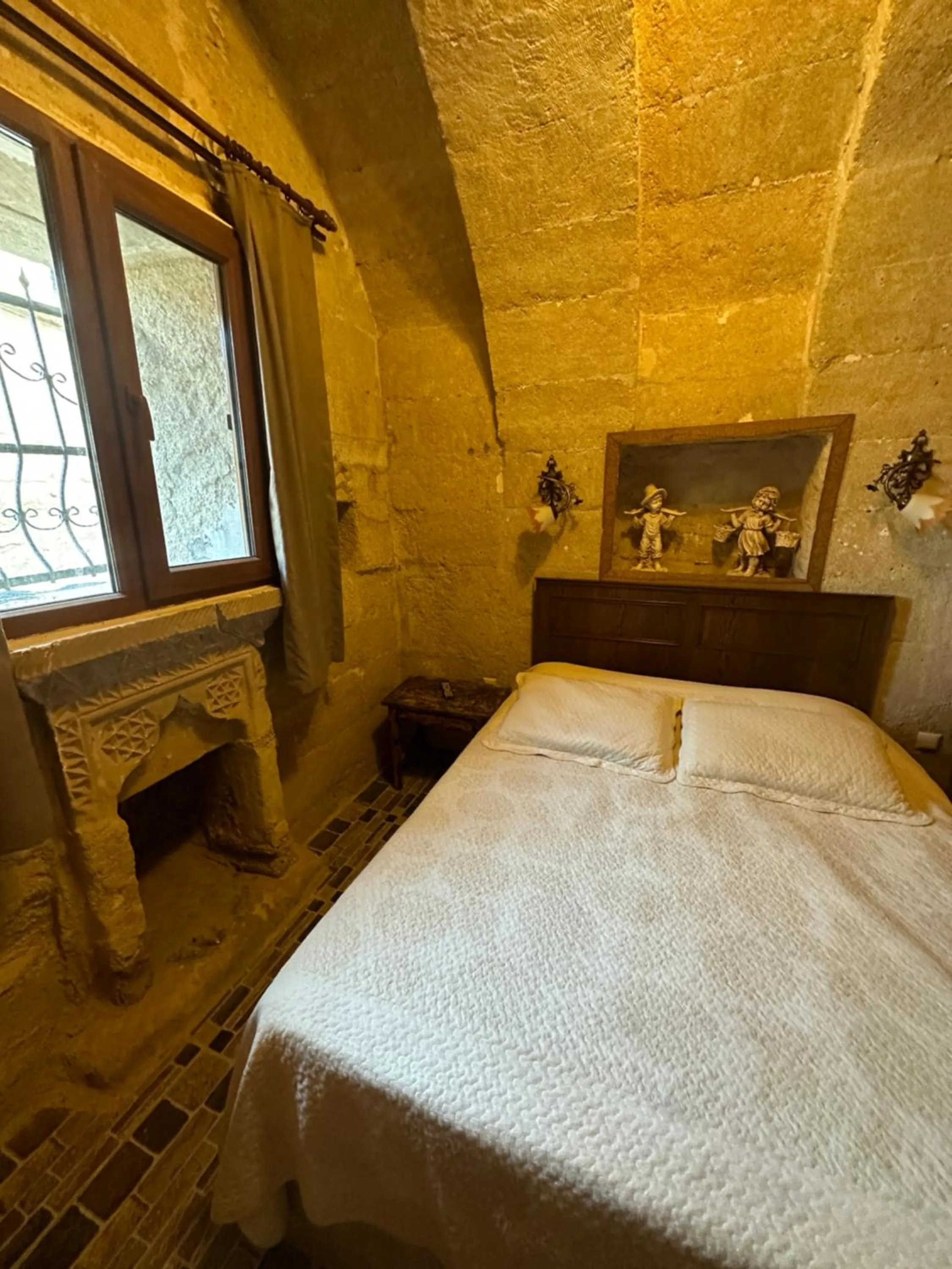 Bed in Uchisar Cave House