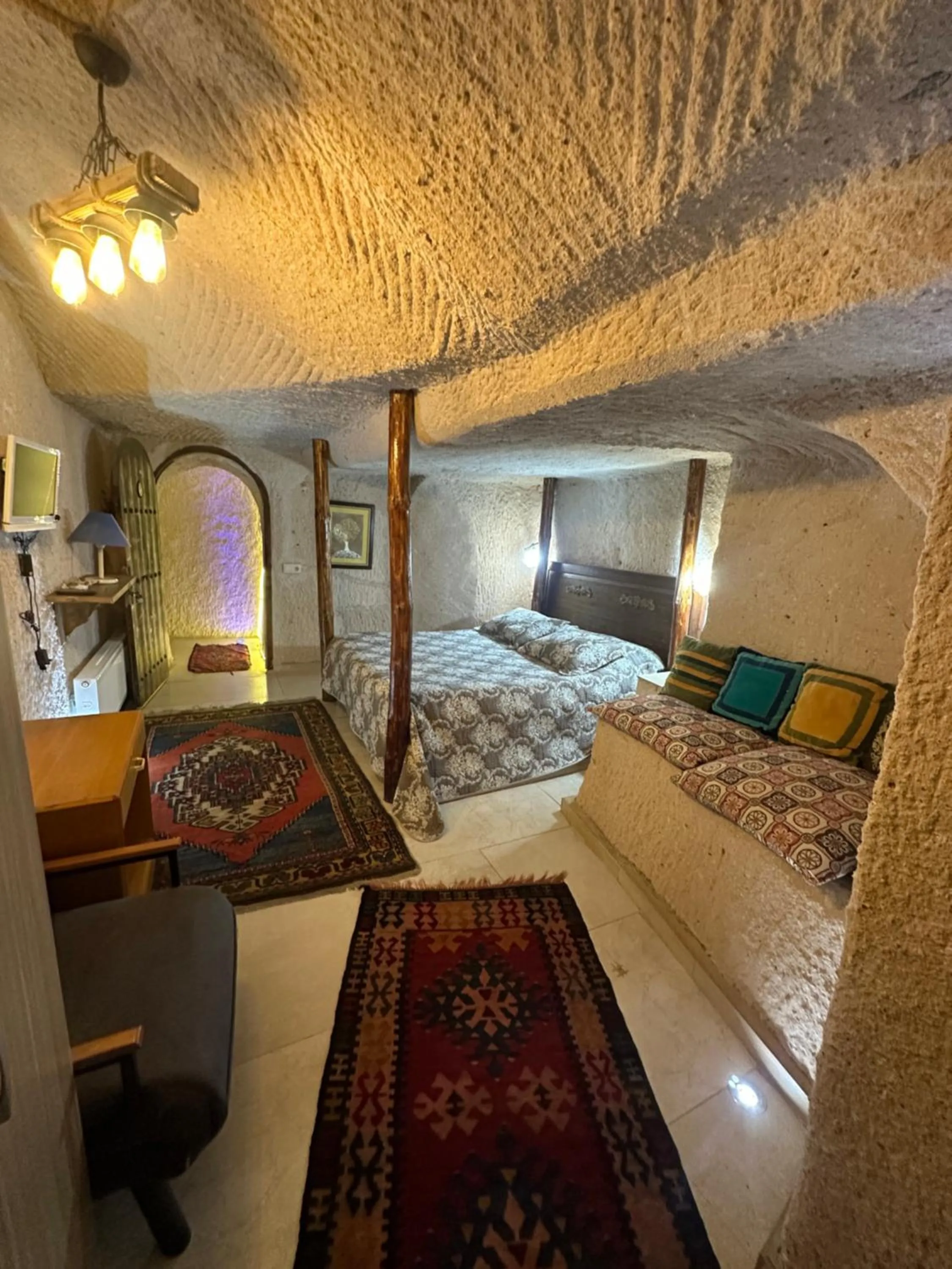 Bed in Uchisar Cave House