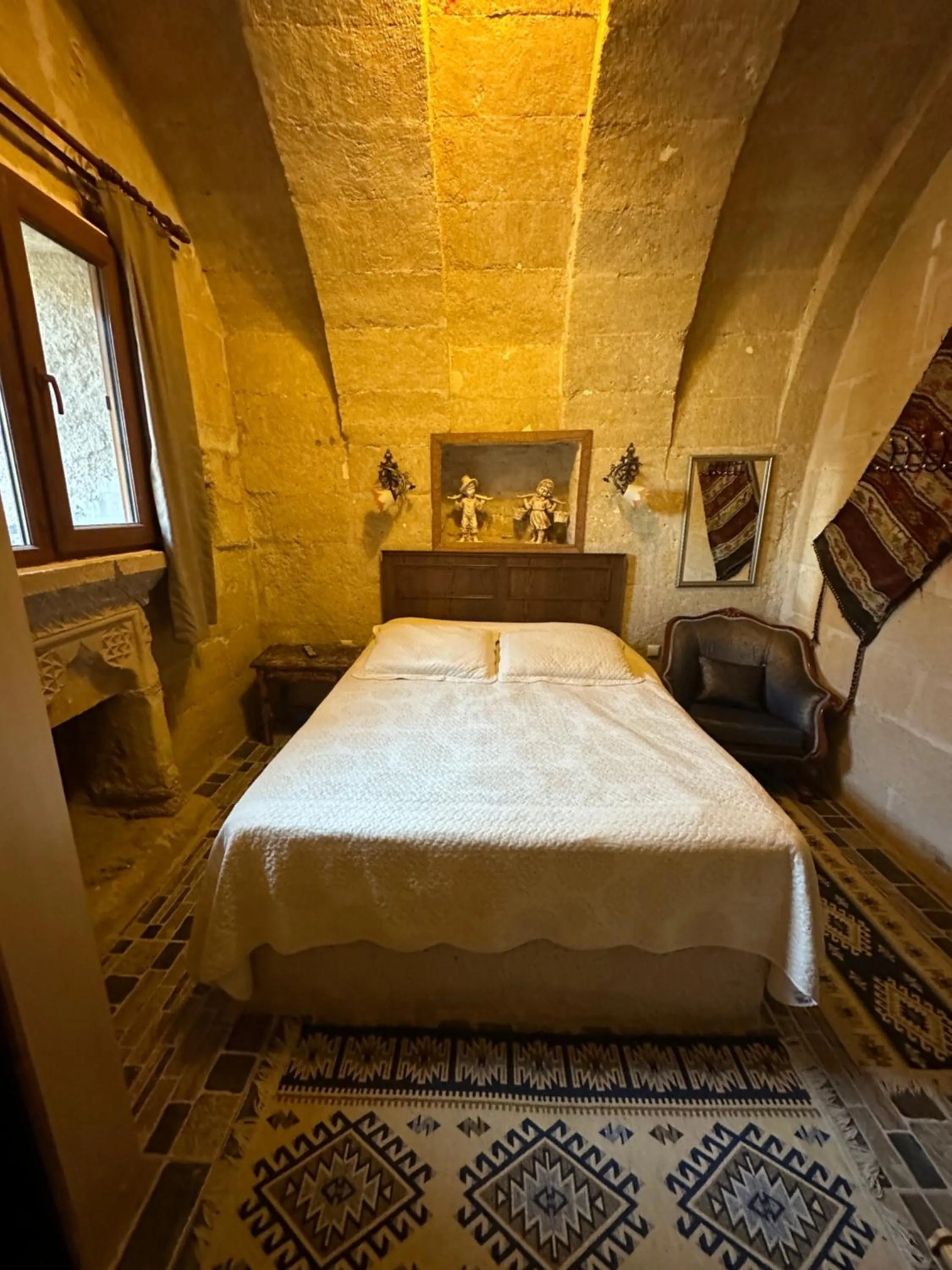 Bed in Uchisar Cave House