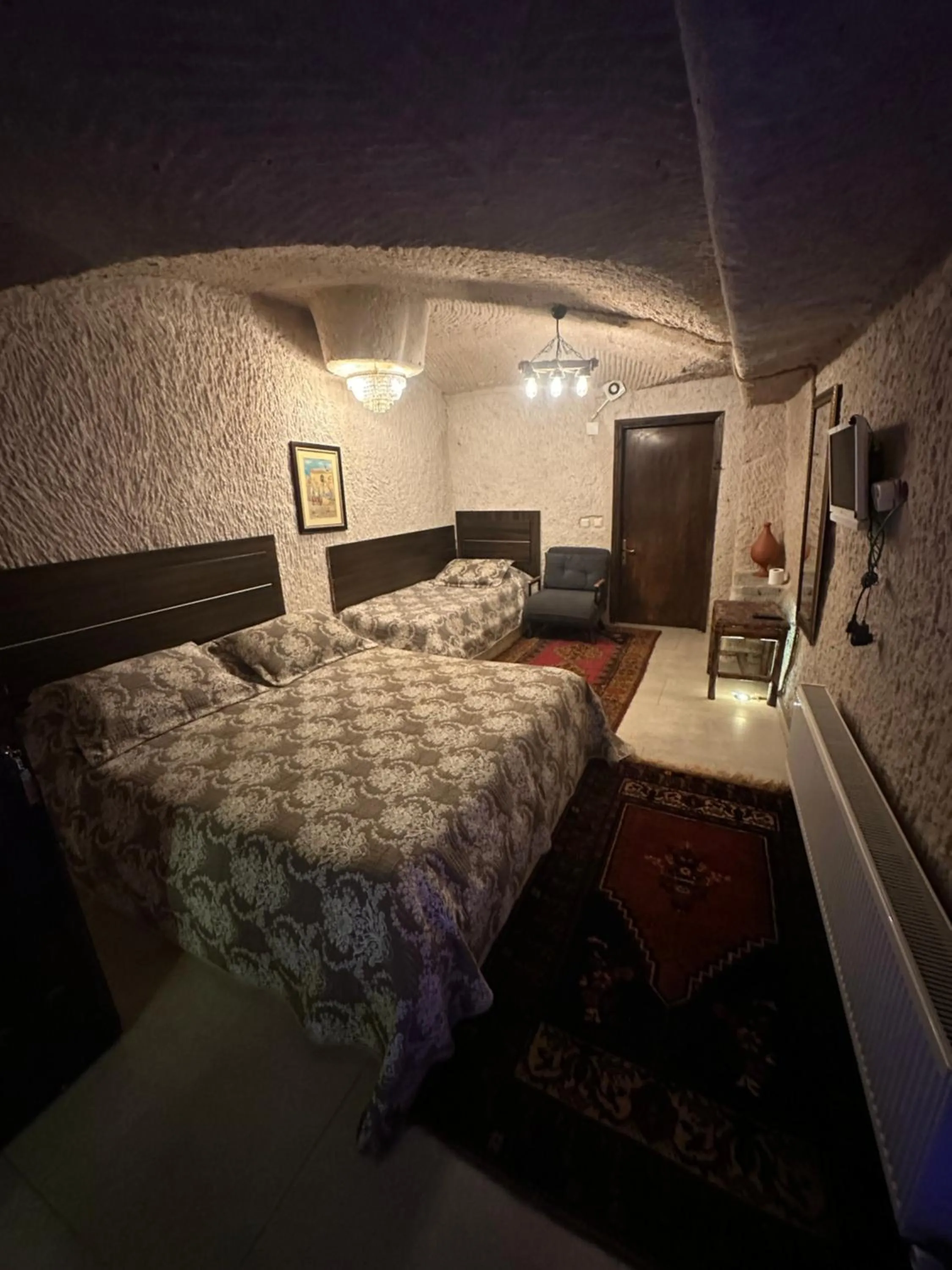 Bed in Uchisar Cave House