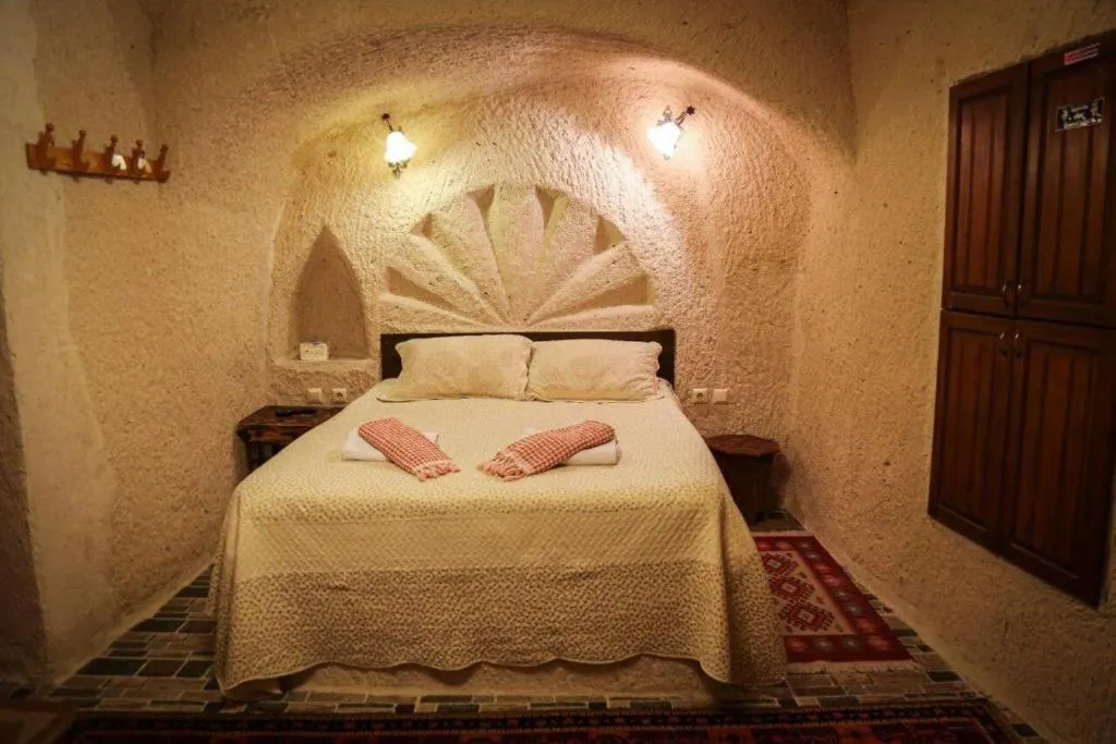Bed in Uchisar Cave House